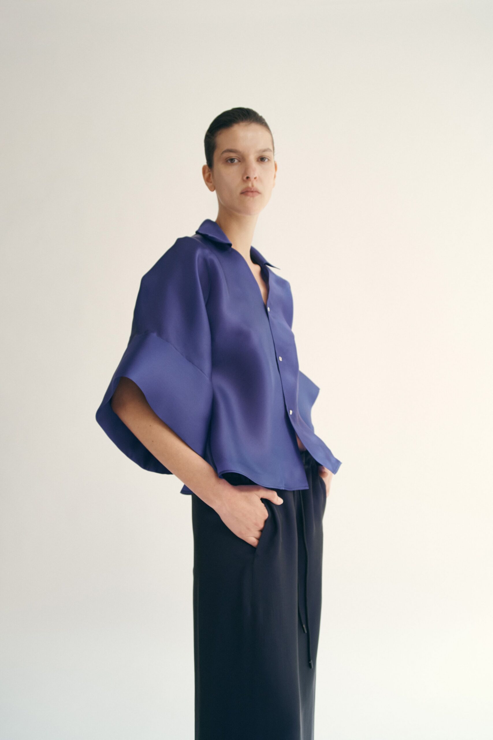 purple silk long-sleeve collared relaxed buttoned flowing top