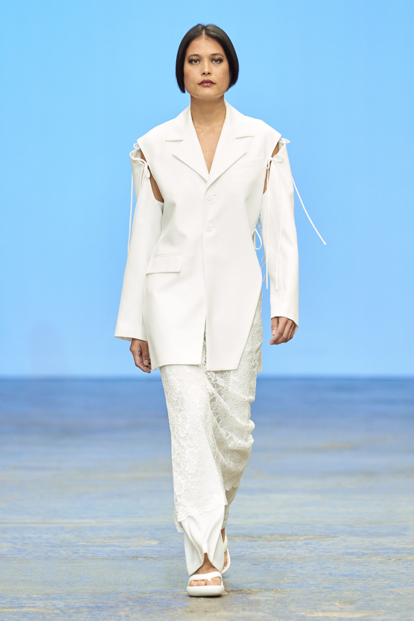 white cotton long-sleeve collared structured zippered blazer