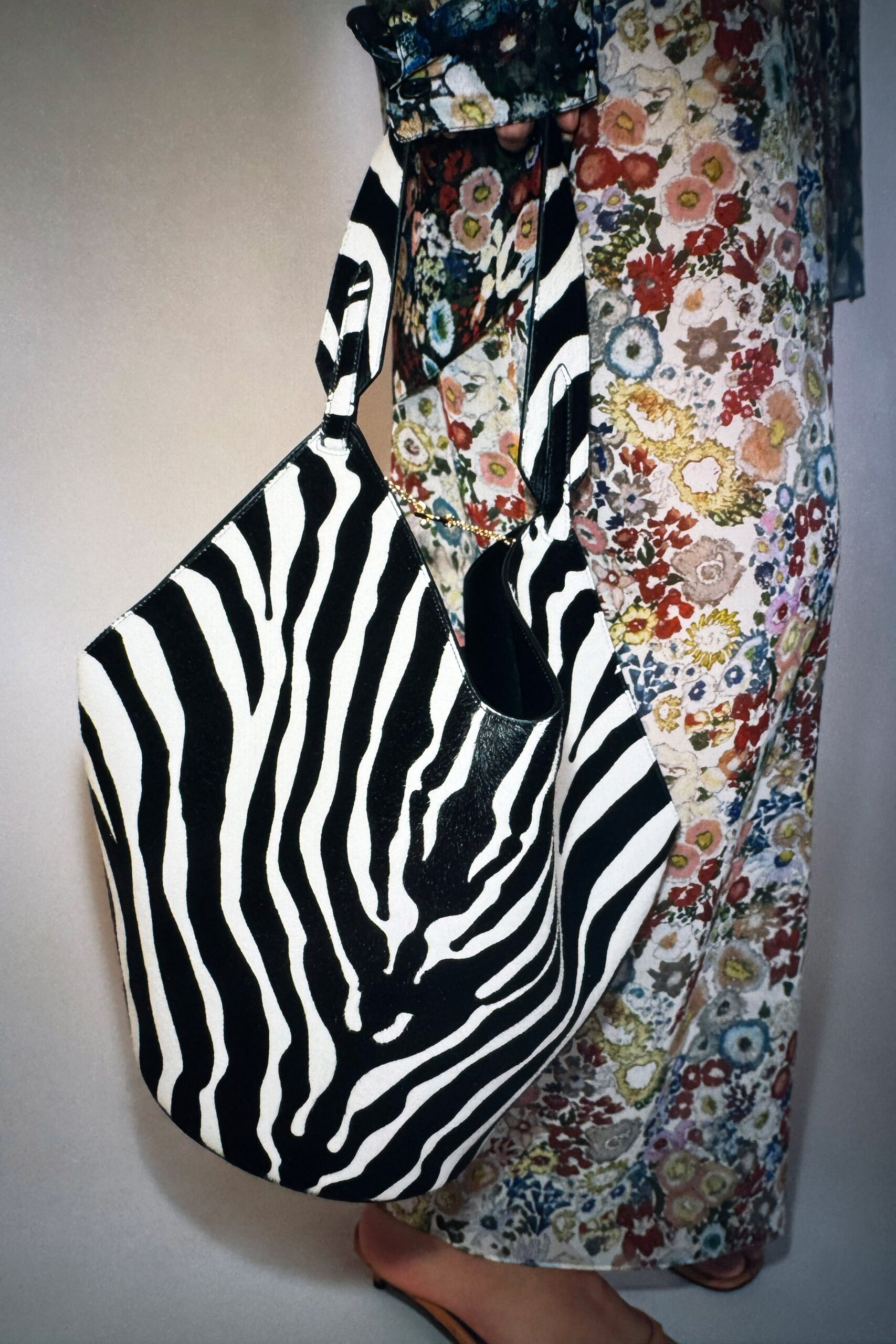 floral midi dress with striped bag