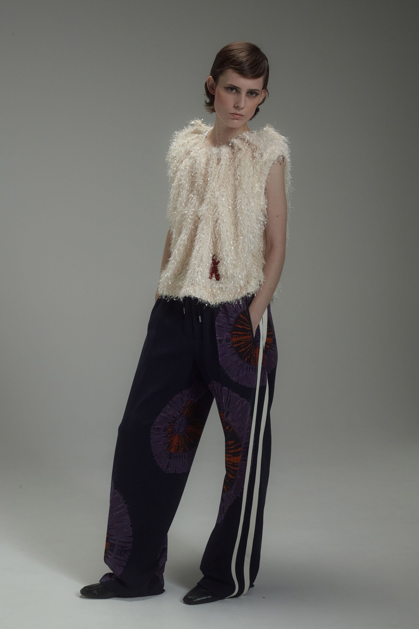 white fur sleeveless high-neck relaxed fringed top