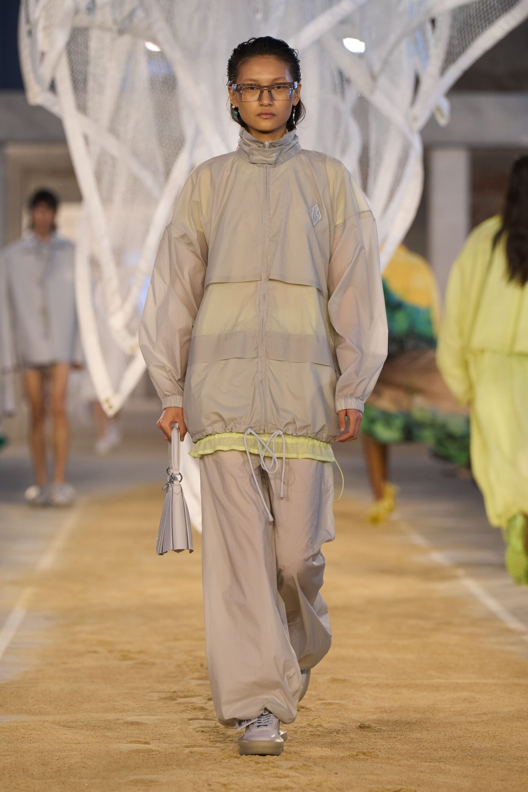 gray nylon jacket with yellow accents