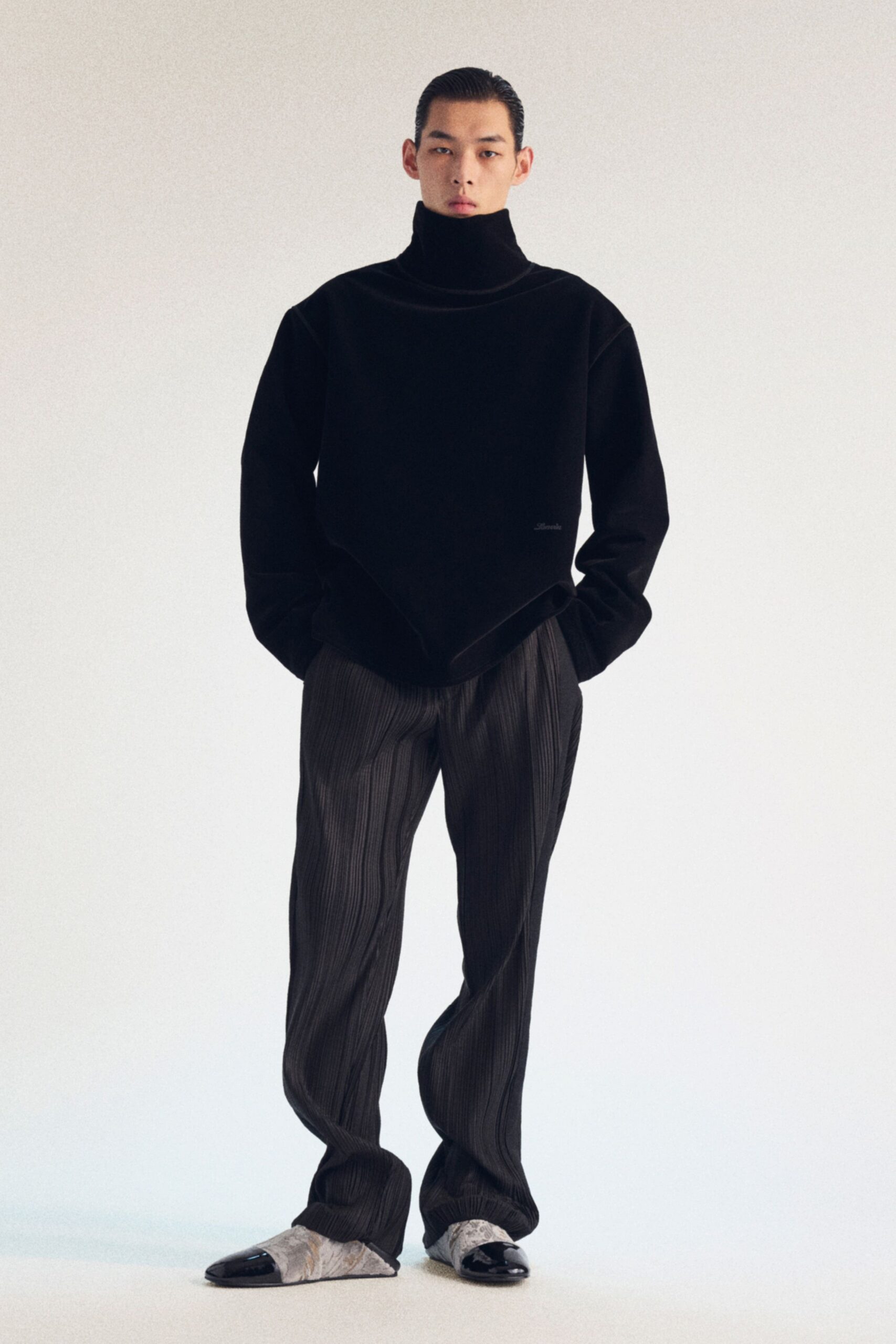 black relaxed sweater and pants