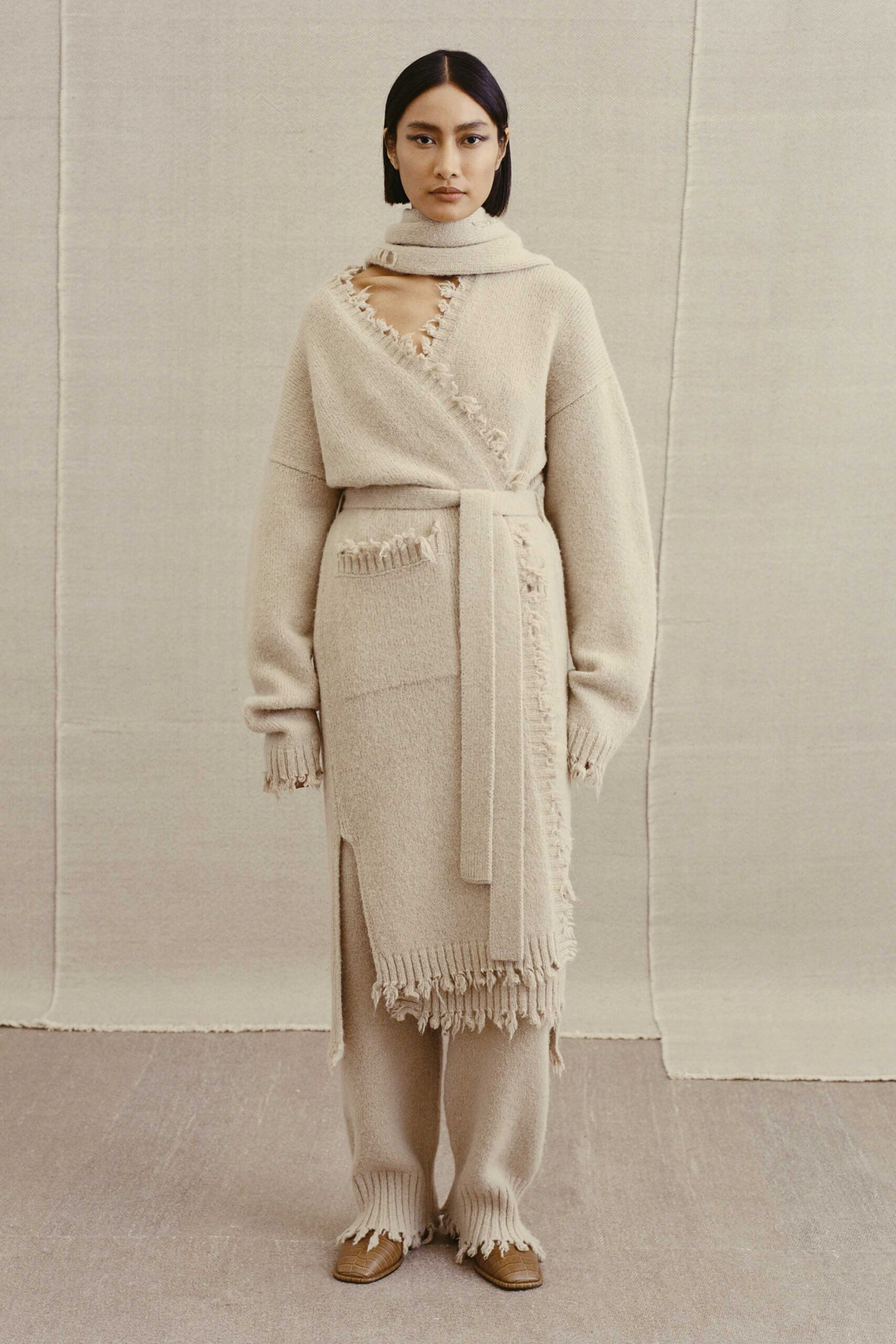 beige wool long-sleeve v-neck relaxed fringed draped sweater