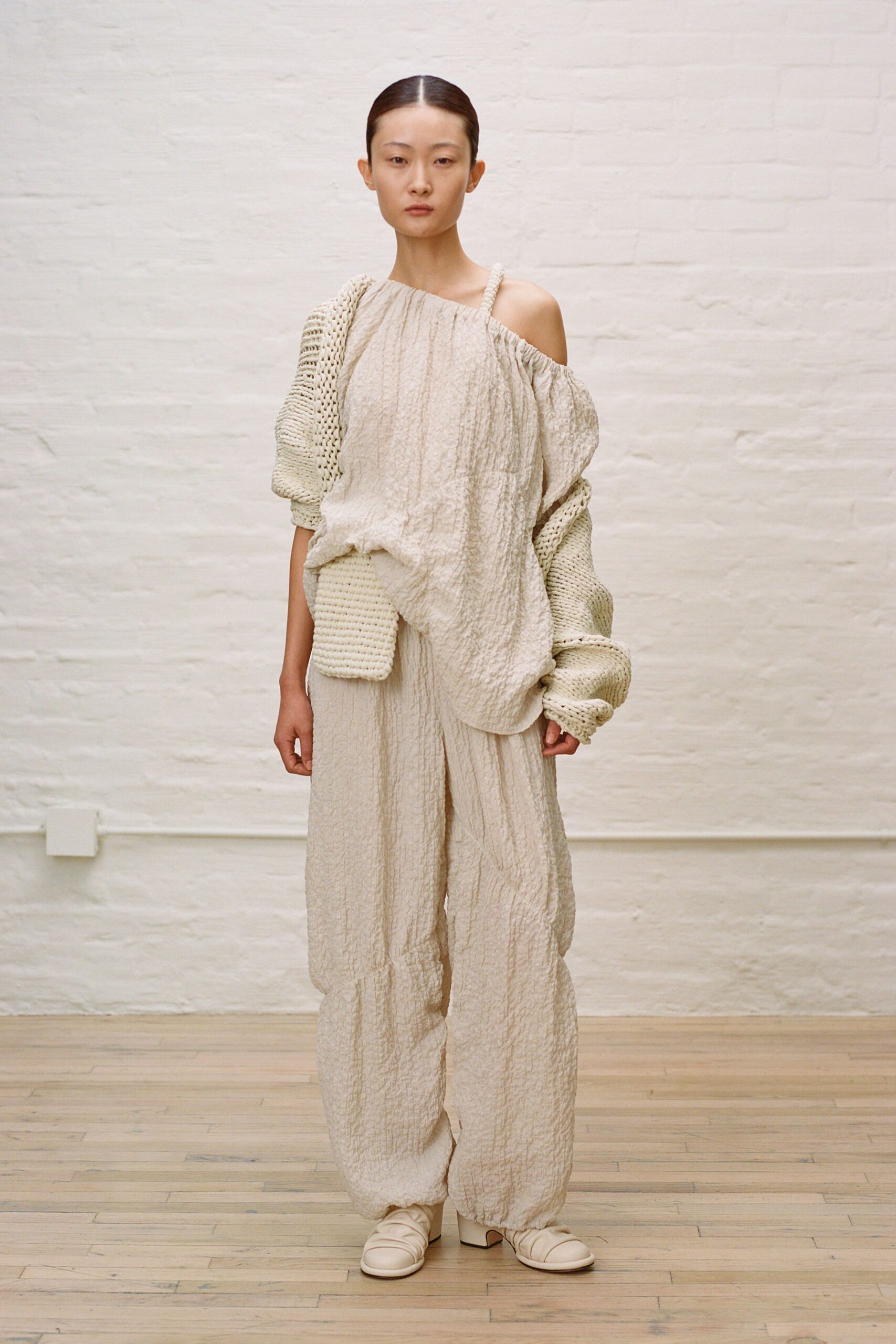 beige cotton sleeveless off-shoulder relaxed pleated top