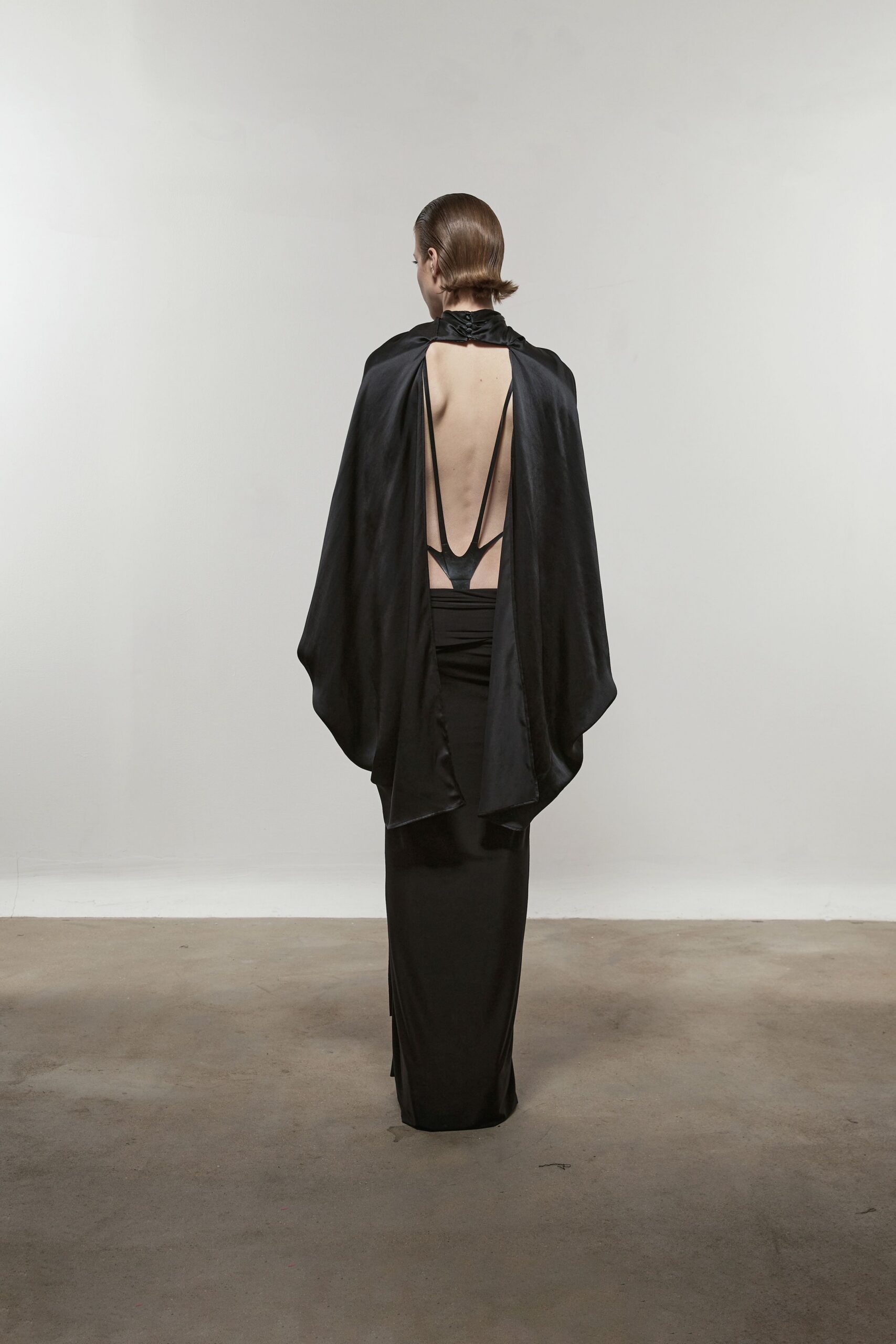 black silk gown and cape