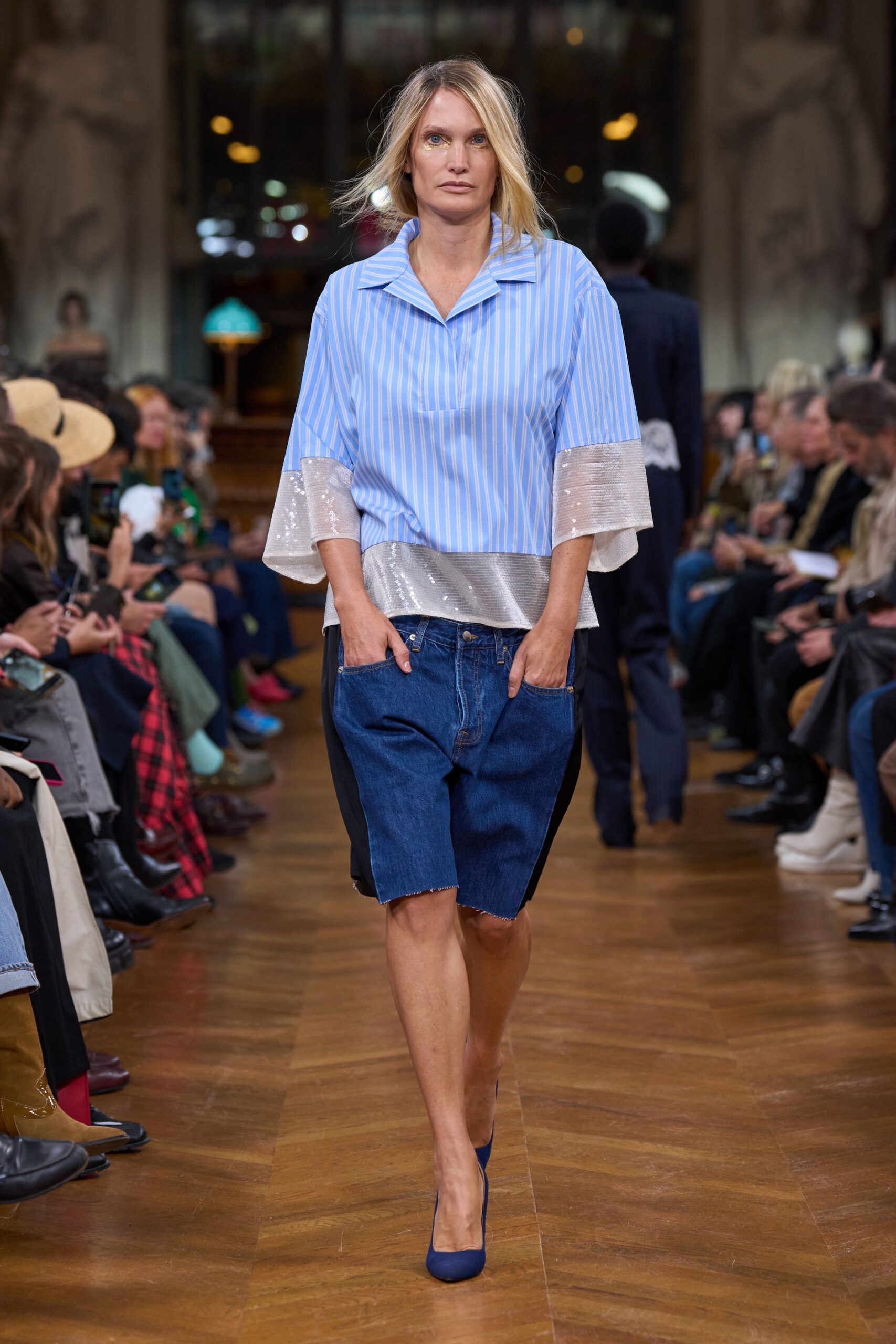 blue striped shirt with denim shorts