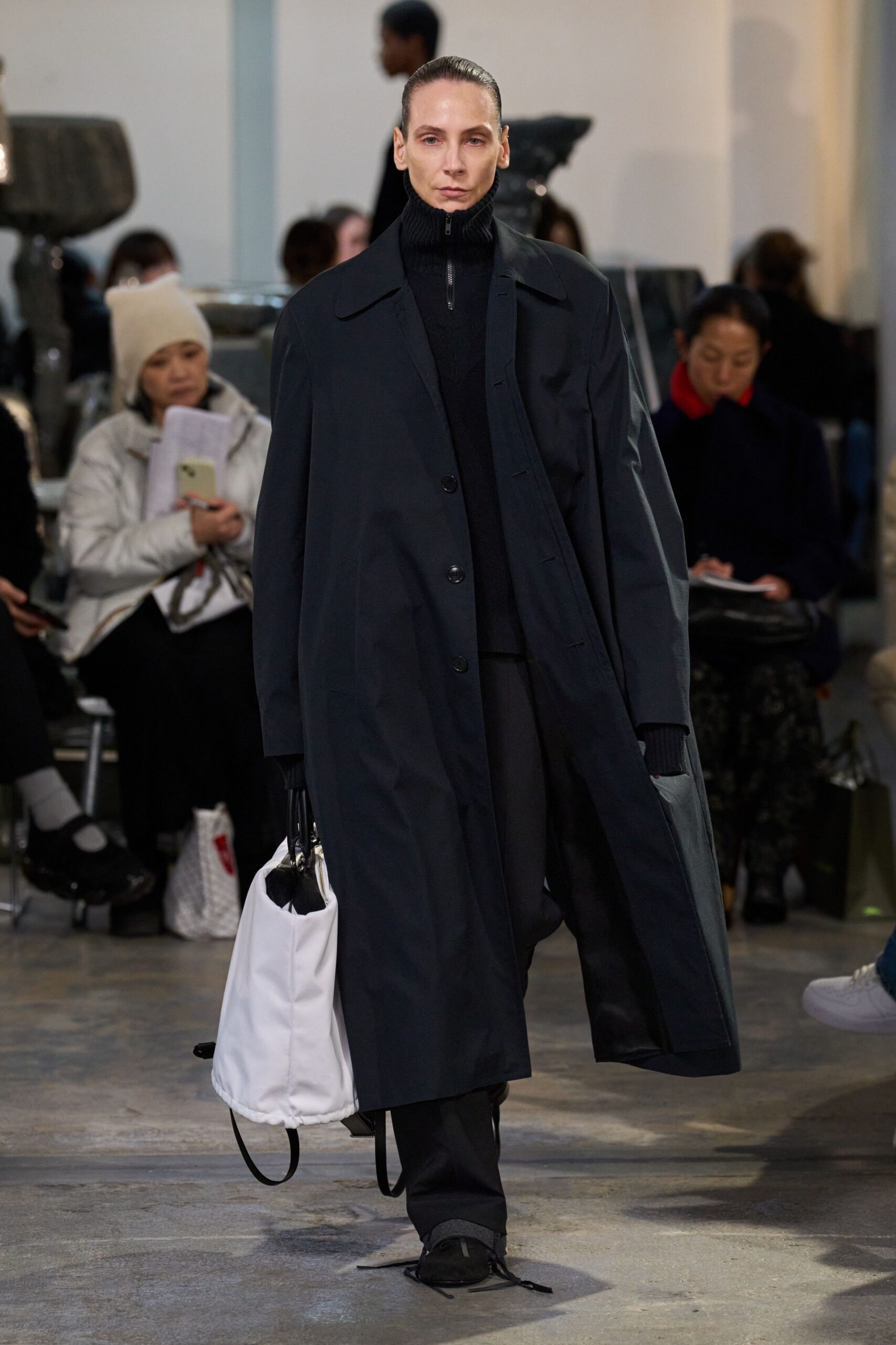 oversized black coat and fitted top