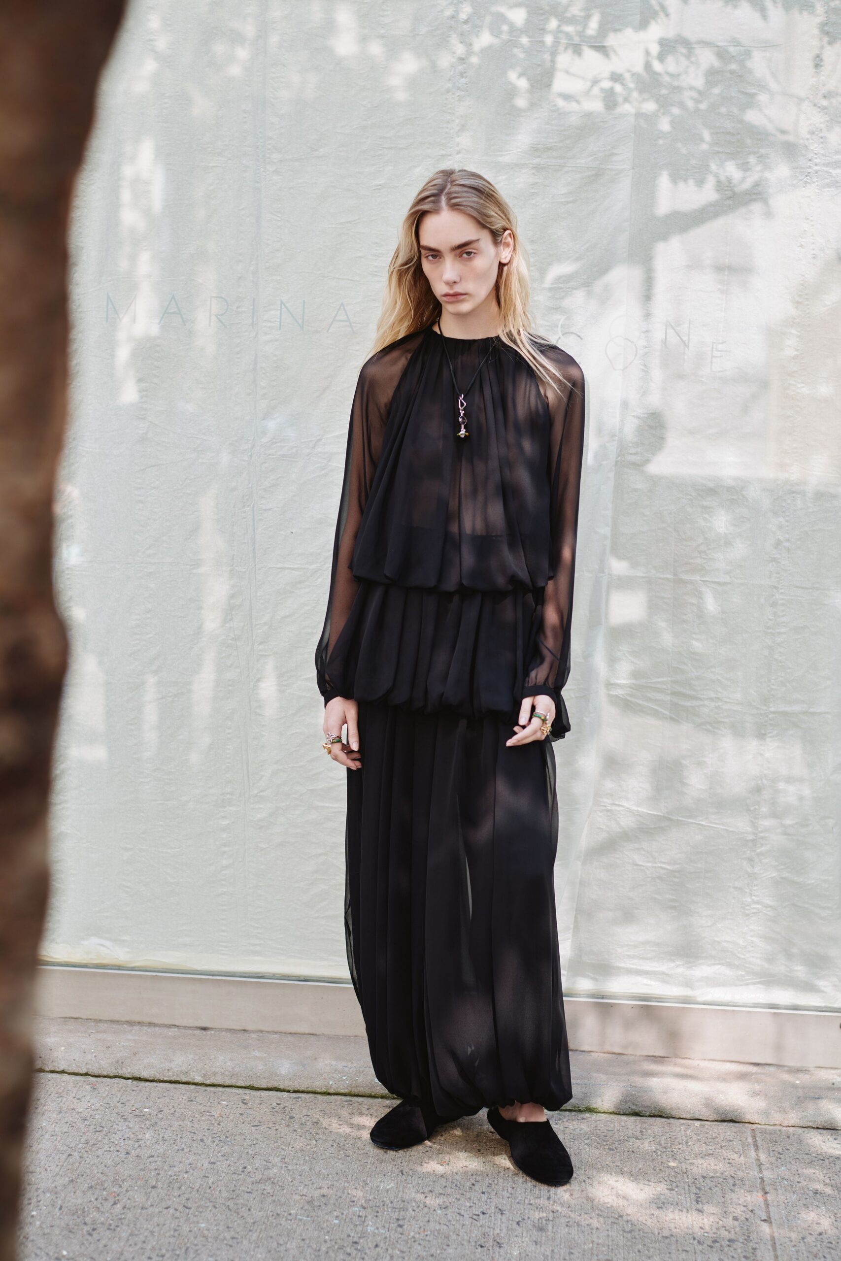 black silk long-sleeve high-neck fitted pleated layered dress