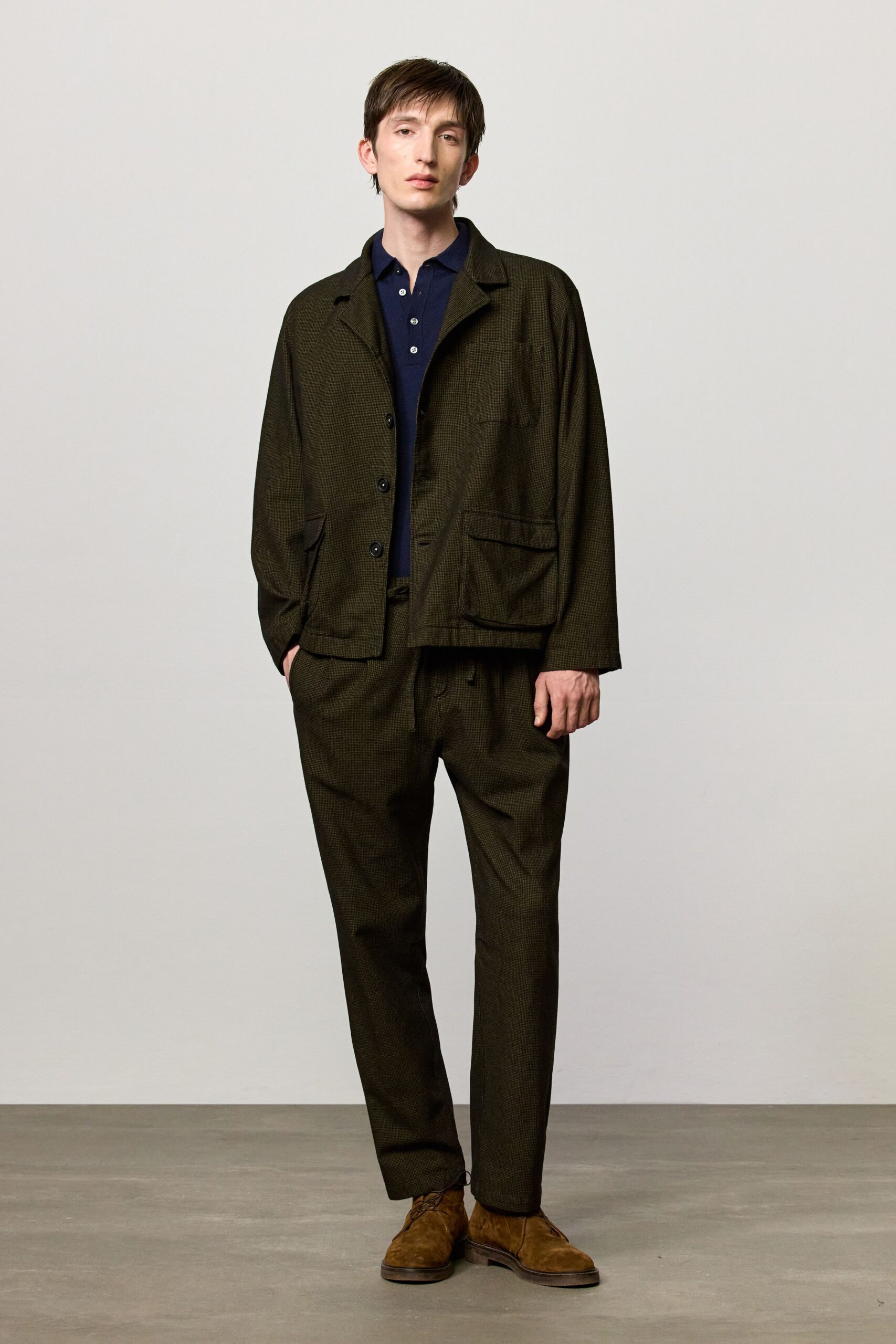 black relaxed jacket with blue shirt