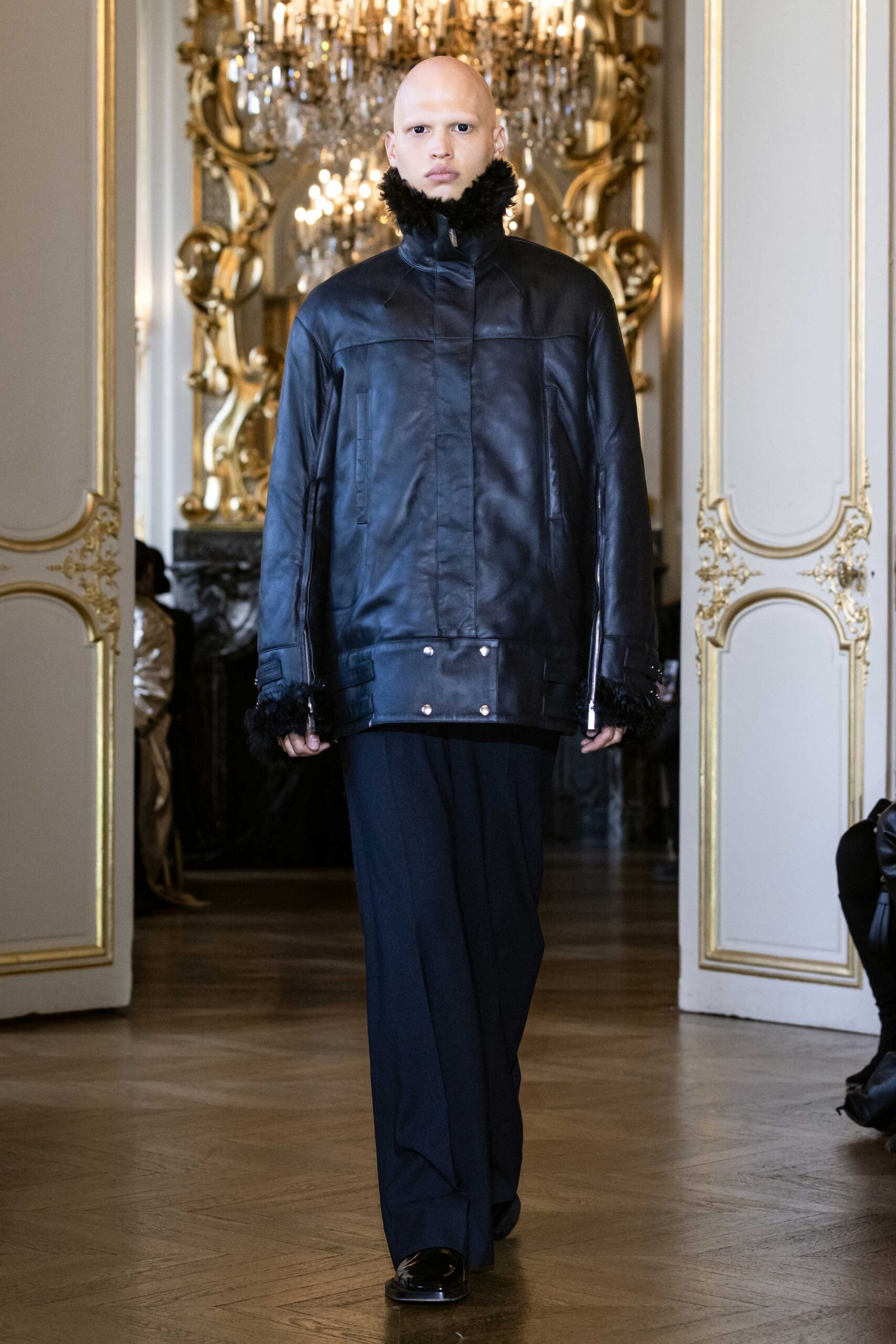 black leather long-sleeve collared relaxed zippered coat
