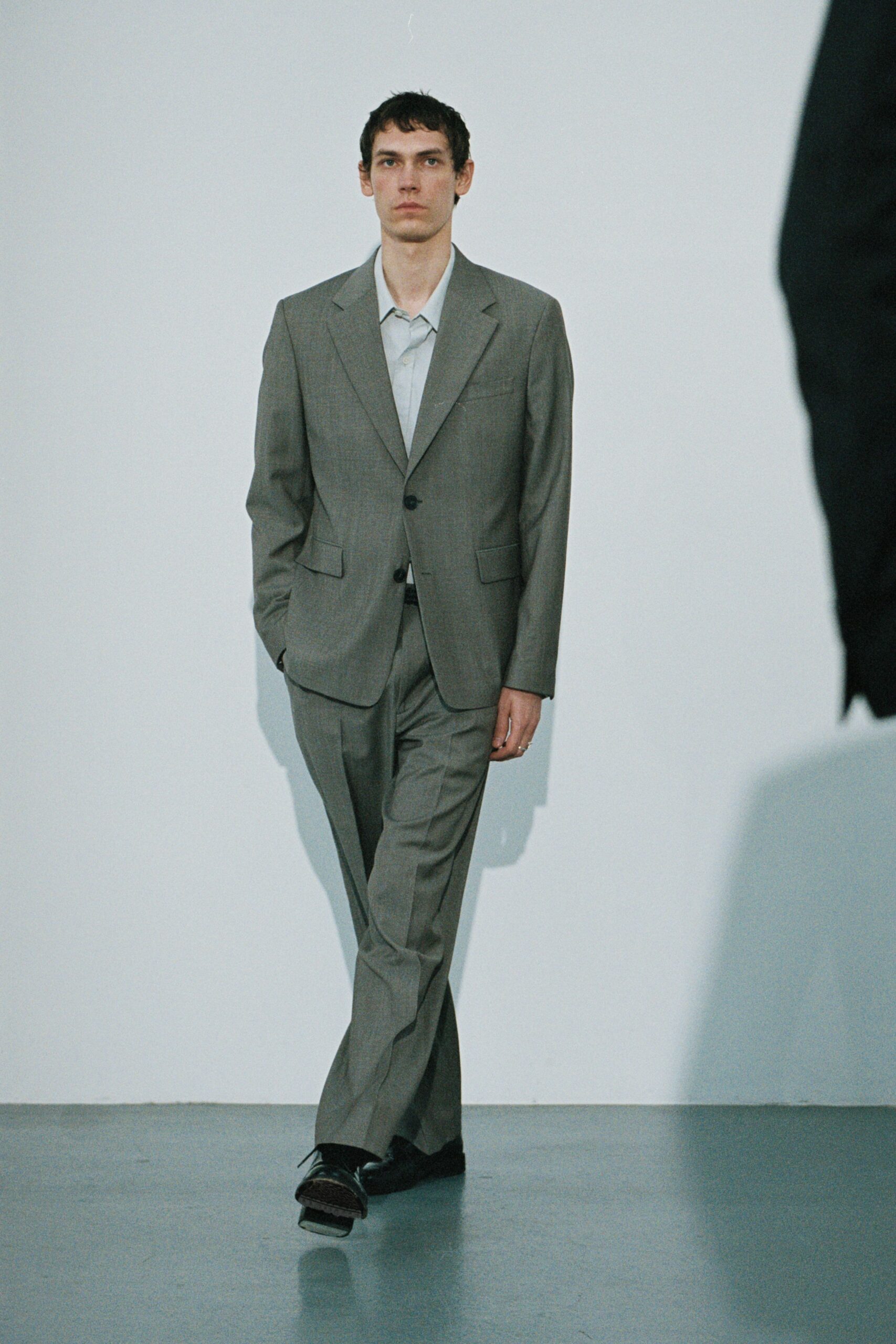 gray tailored suit with white shirt