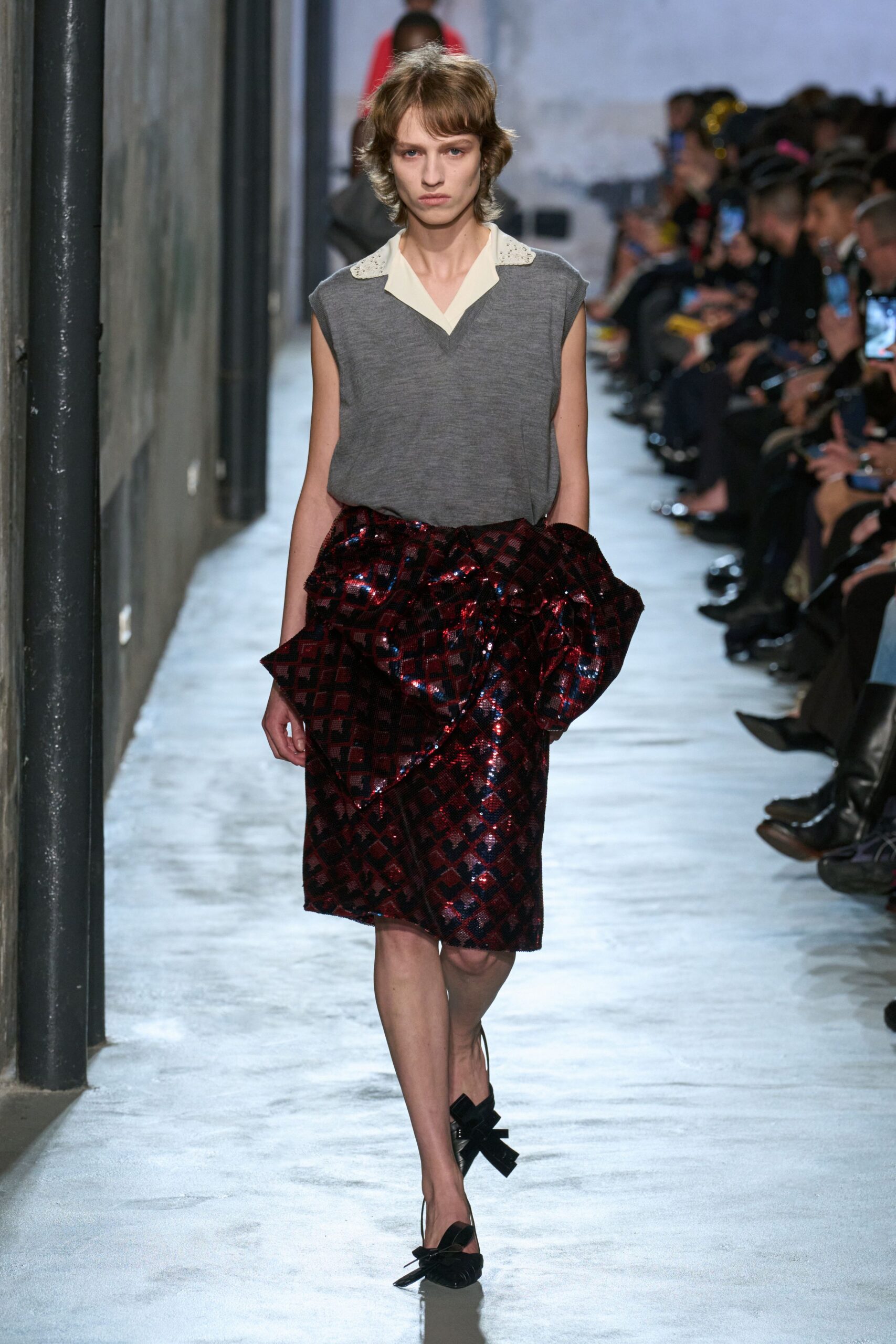 gray sleeveless top with pleated skirt