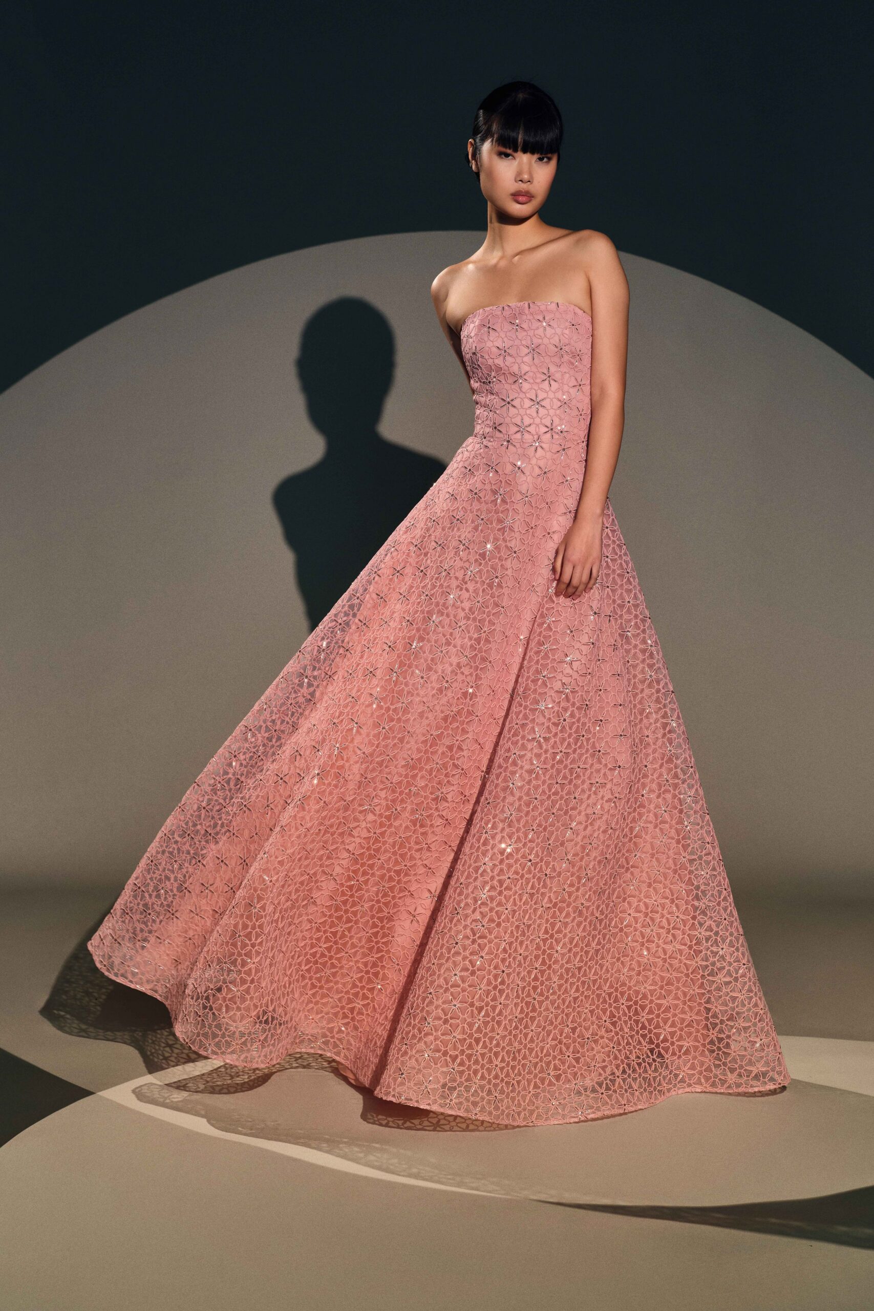 pink embroidered strapless gown