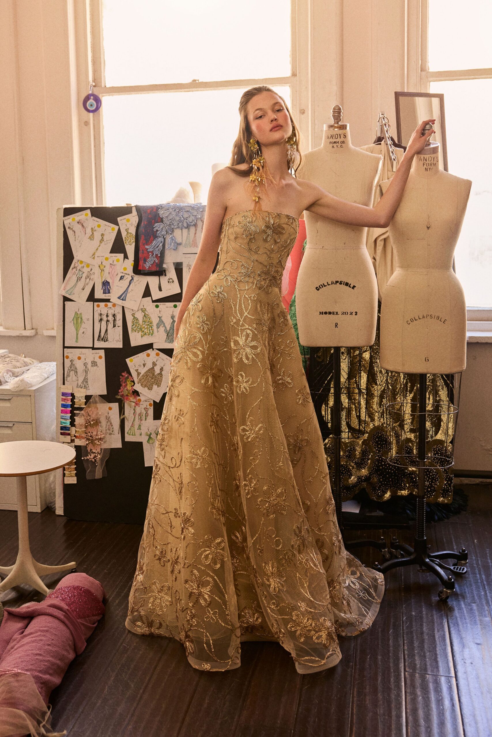 gold embroidered strapless gown