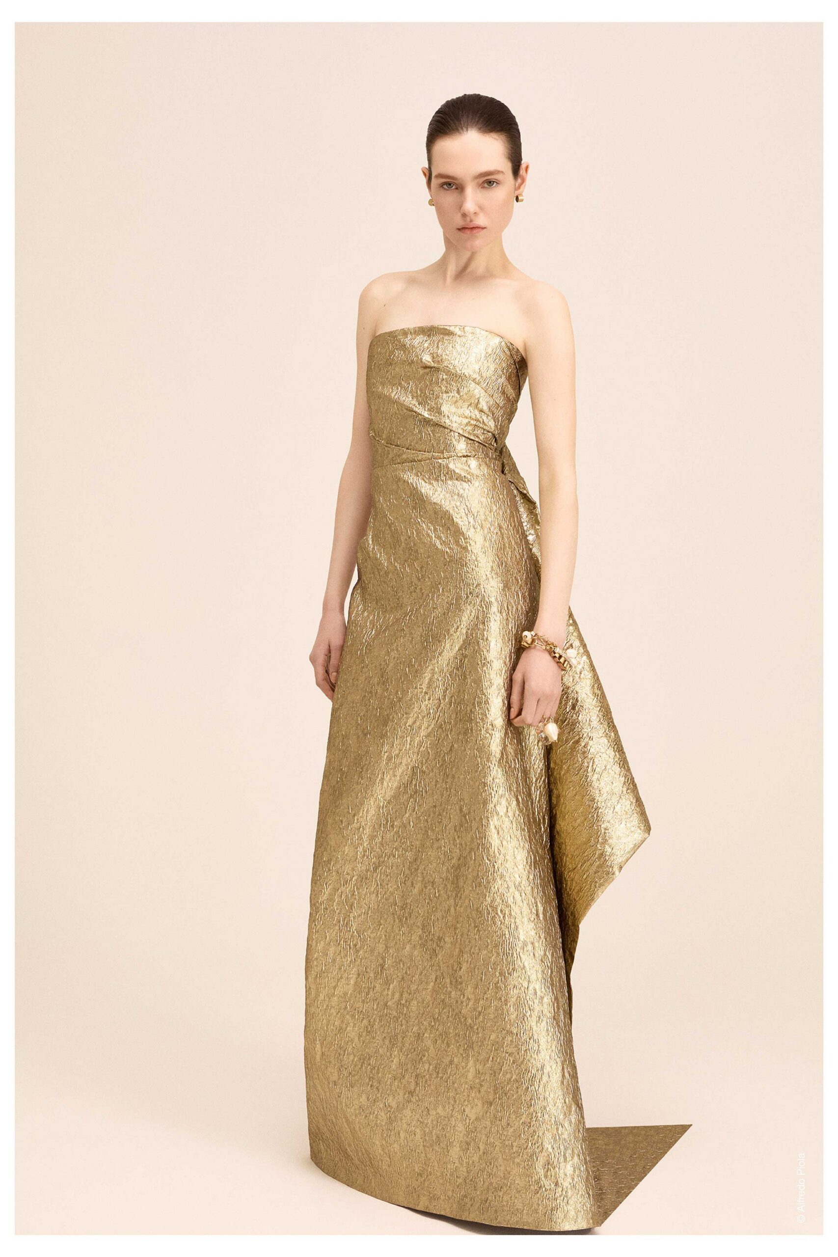 gold strapless draped gown