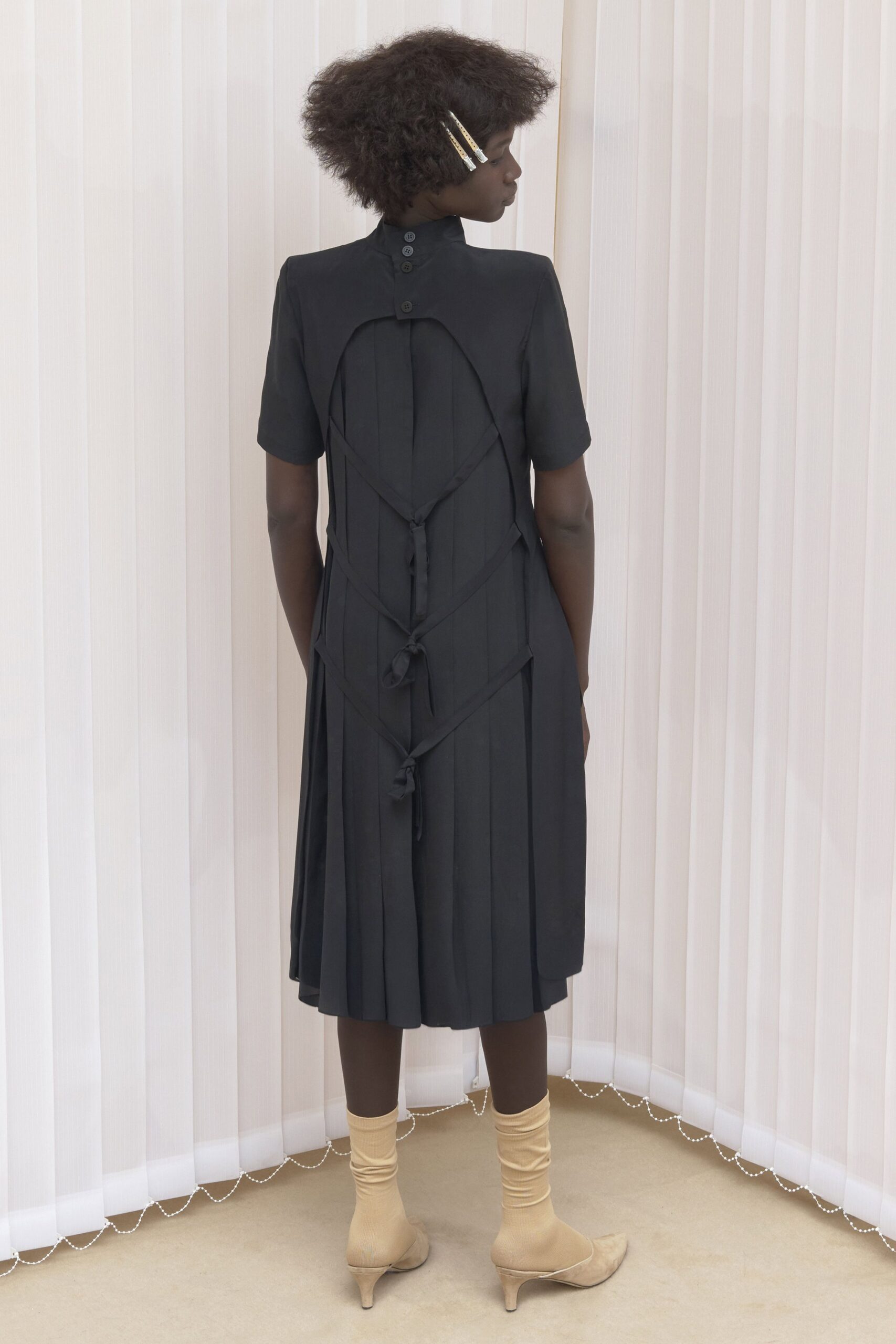 black silk short-sleeve collared fitted pleated draped dress