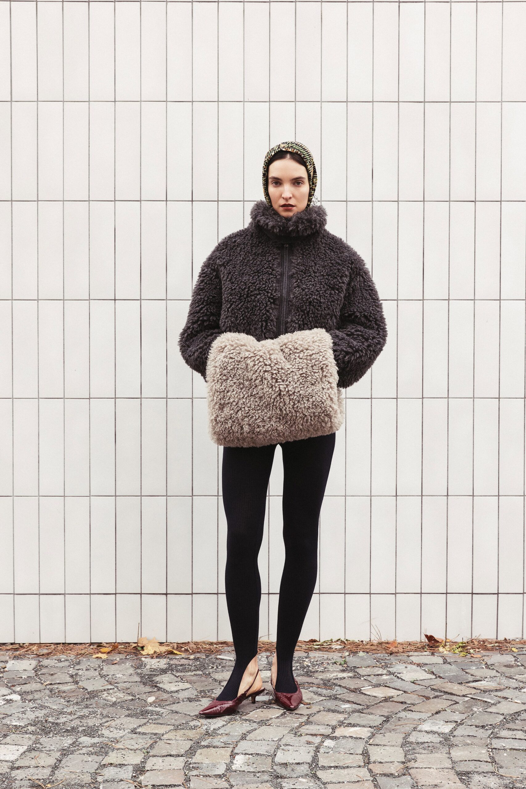 gray faux-fur jacket with leggings