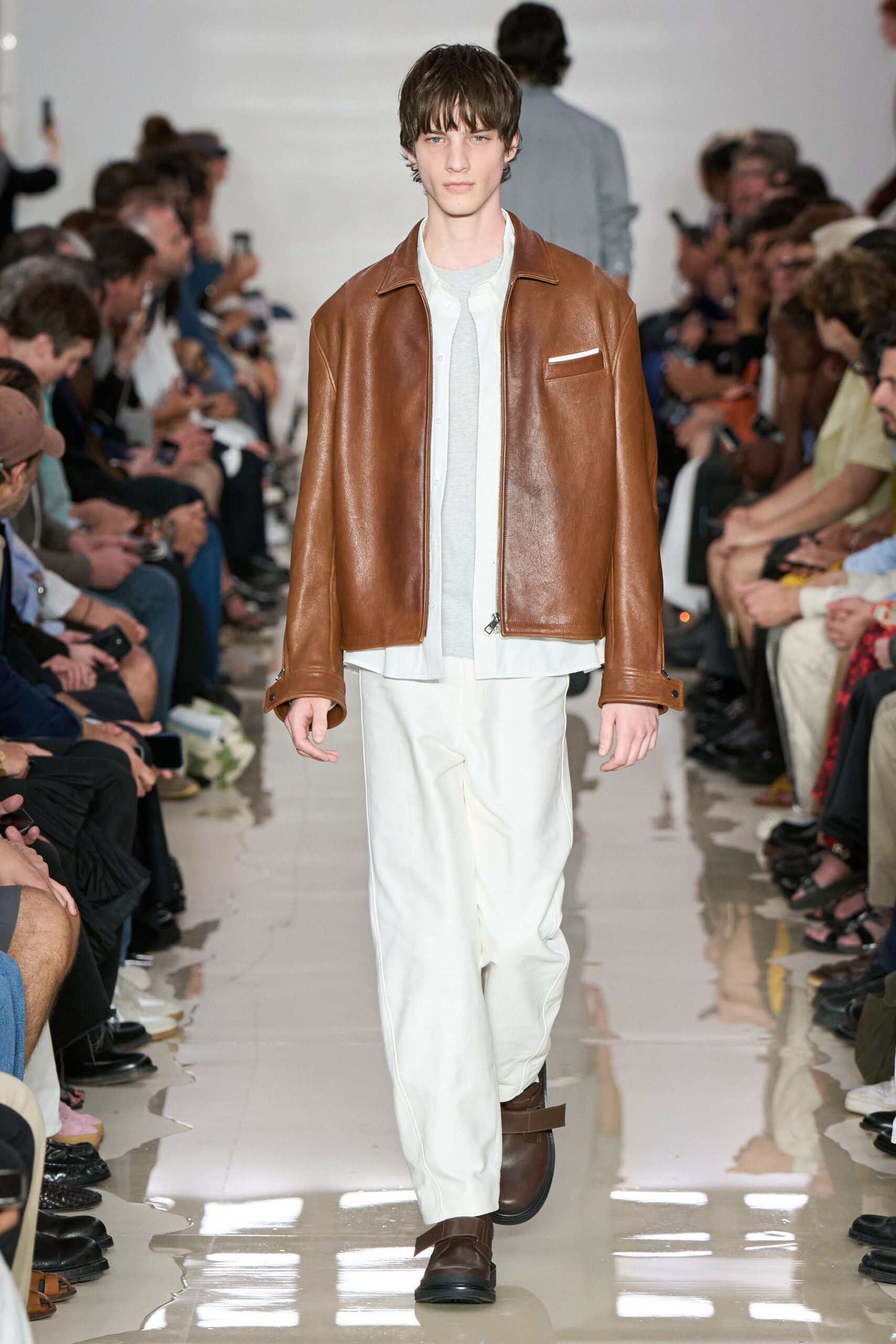 brown leather jacket with gray shirt