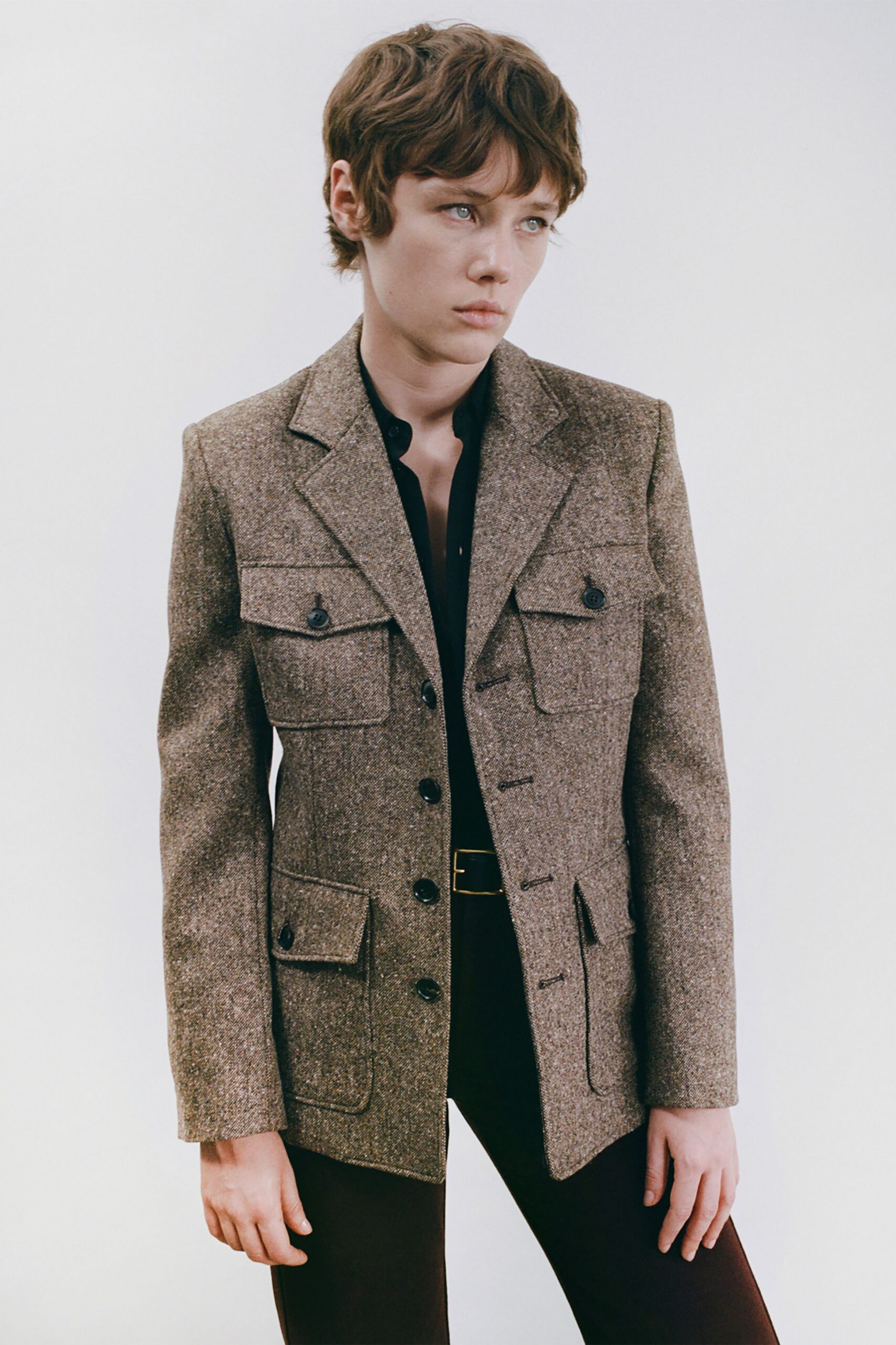 brown tweed tailored blazer with black pants