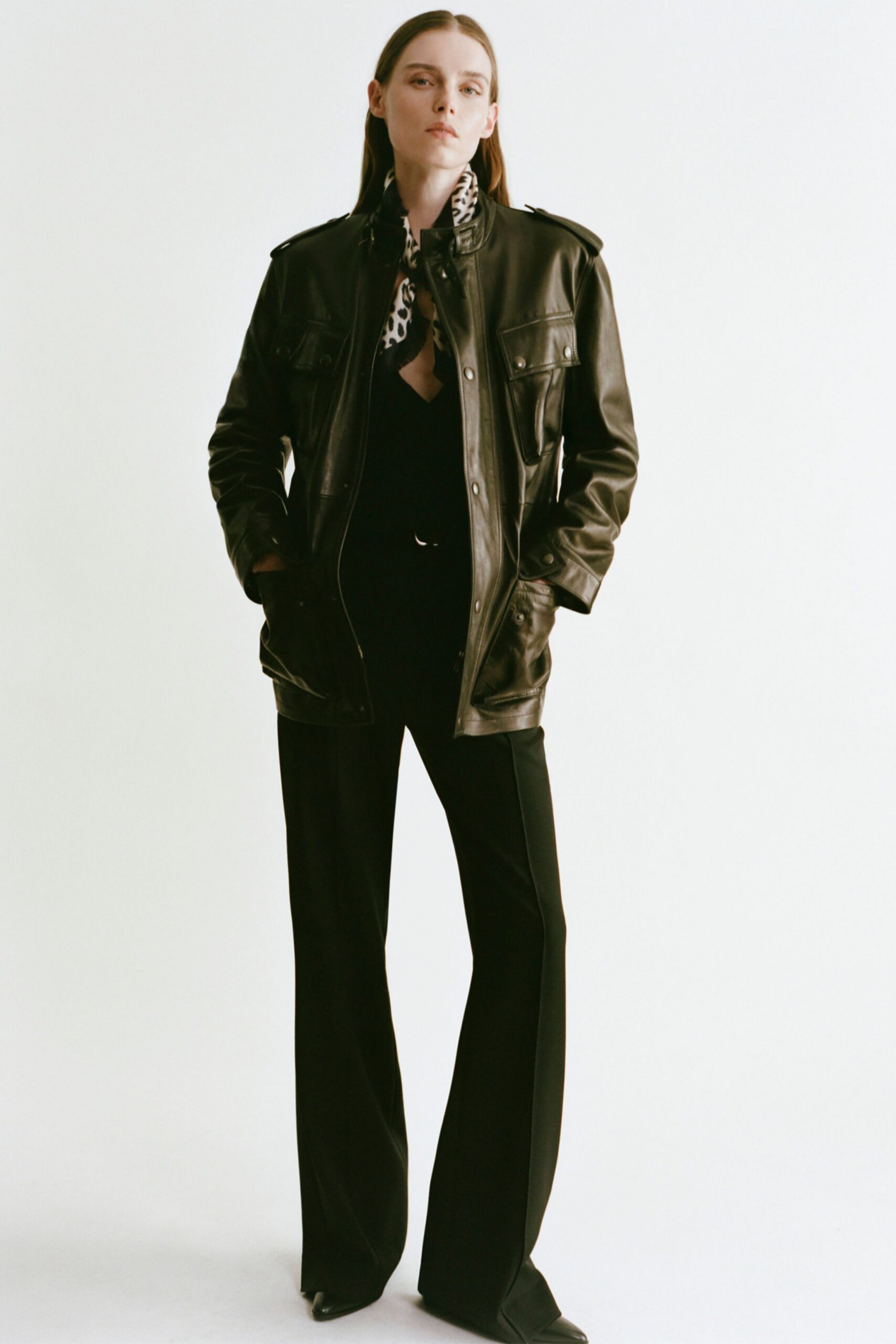 black leather long-sleeve collared relaxed buttoned jacket