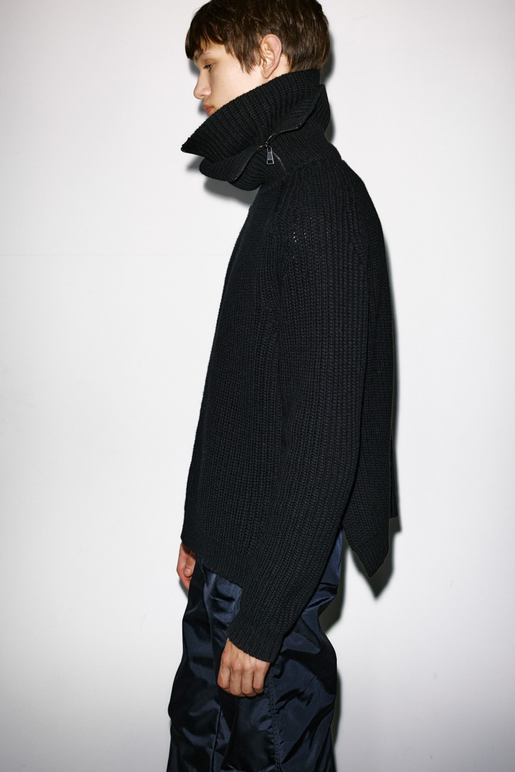 black wool long-sleeve turtleneck relaxed ribbed sweater