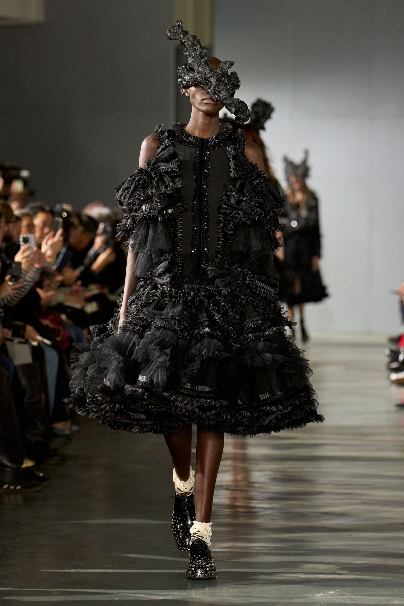 black ruffled midi dress with textured shoes