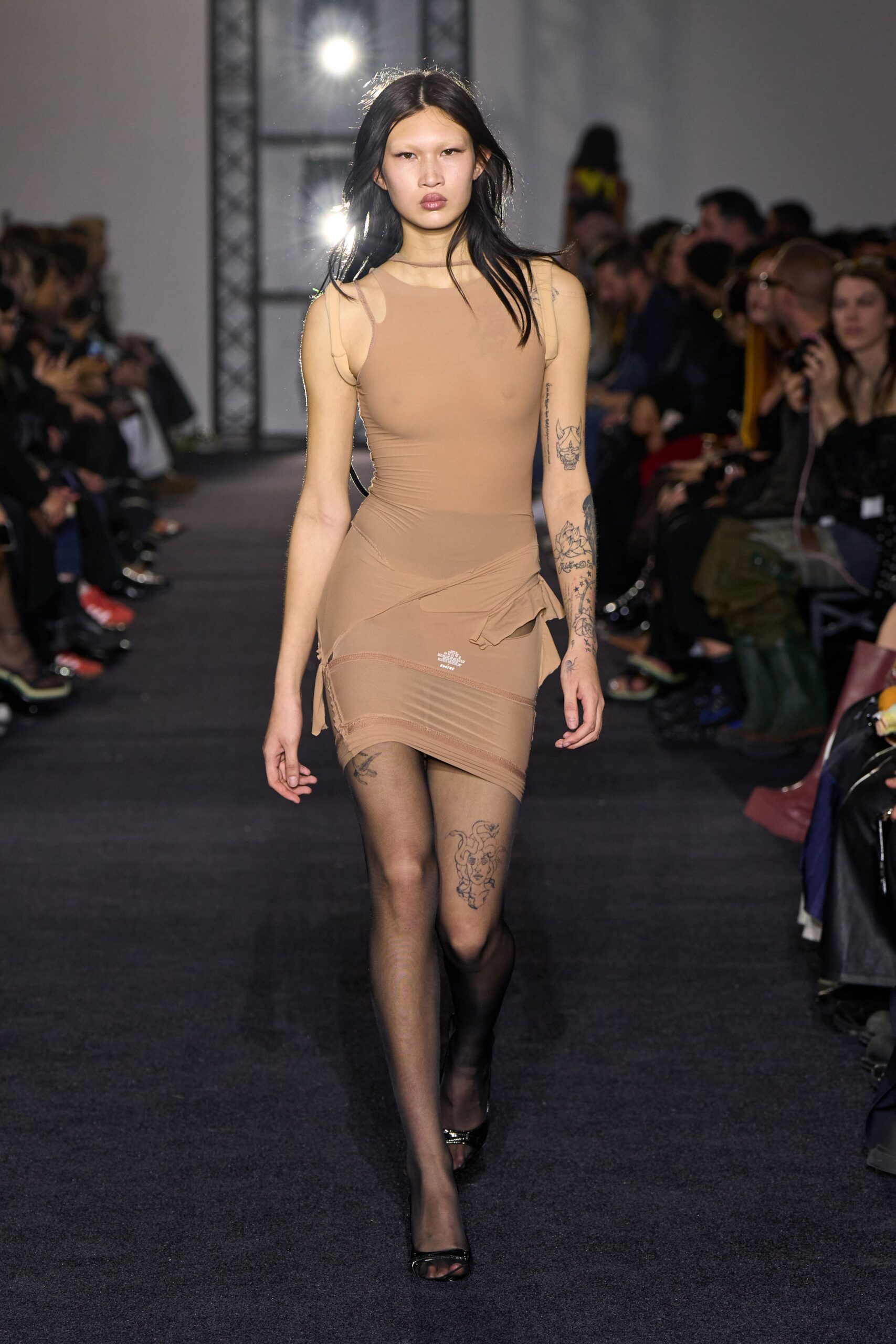 beige silk sleeveless v-neck fitted ruched sheer dress