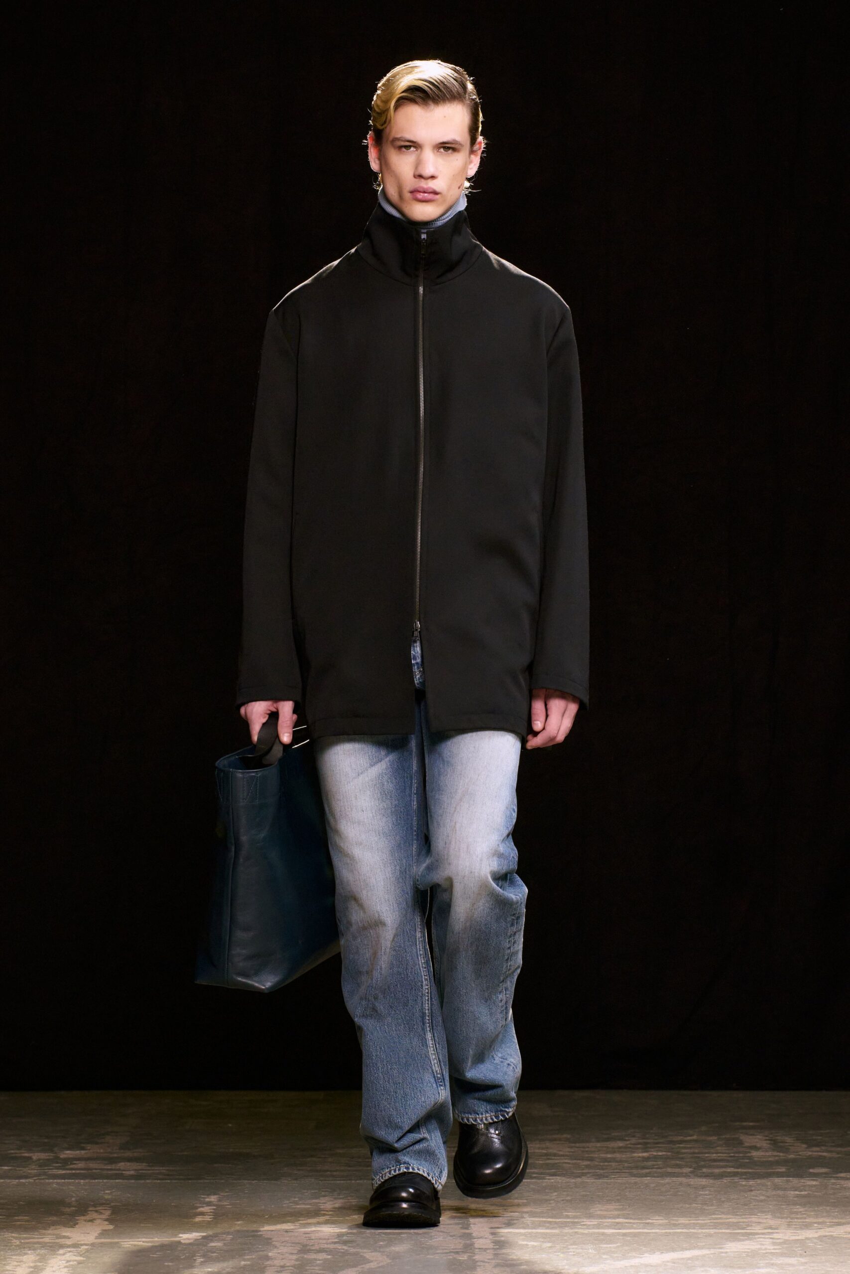 black oversized jacket with blue jeans