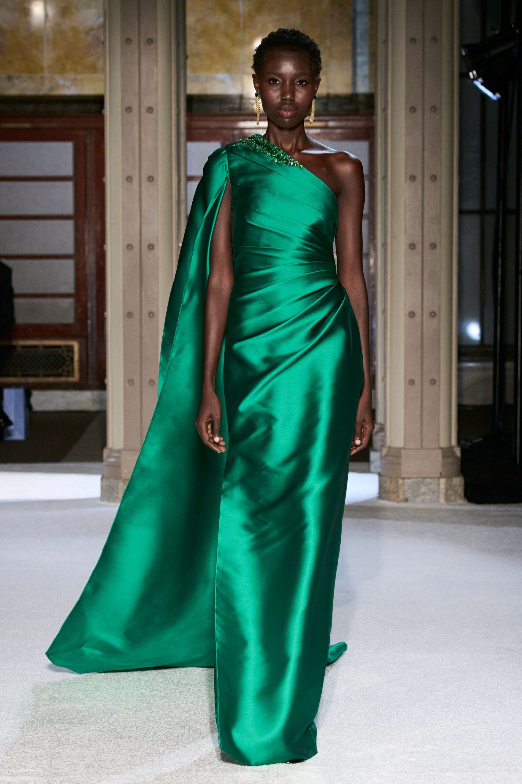 green satin off-shoulder gown