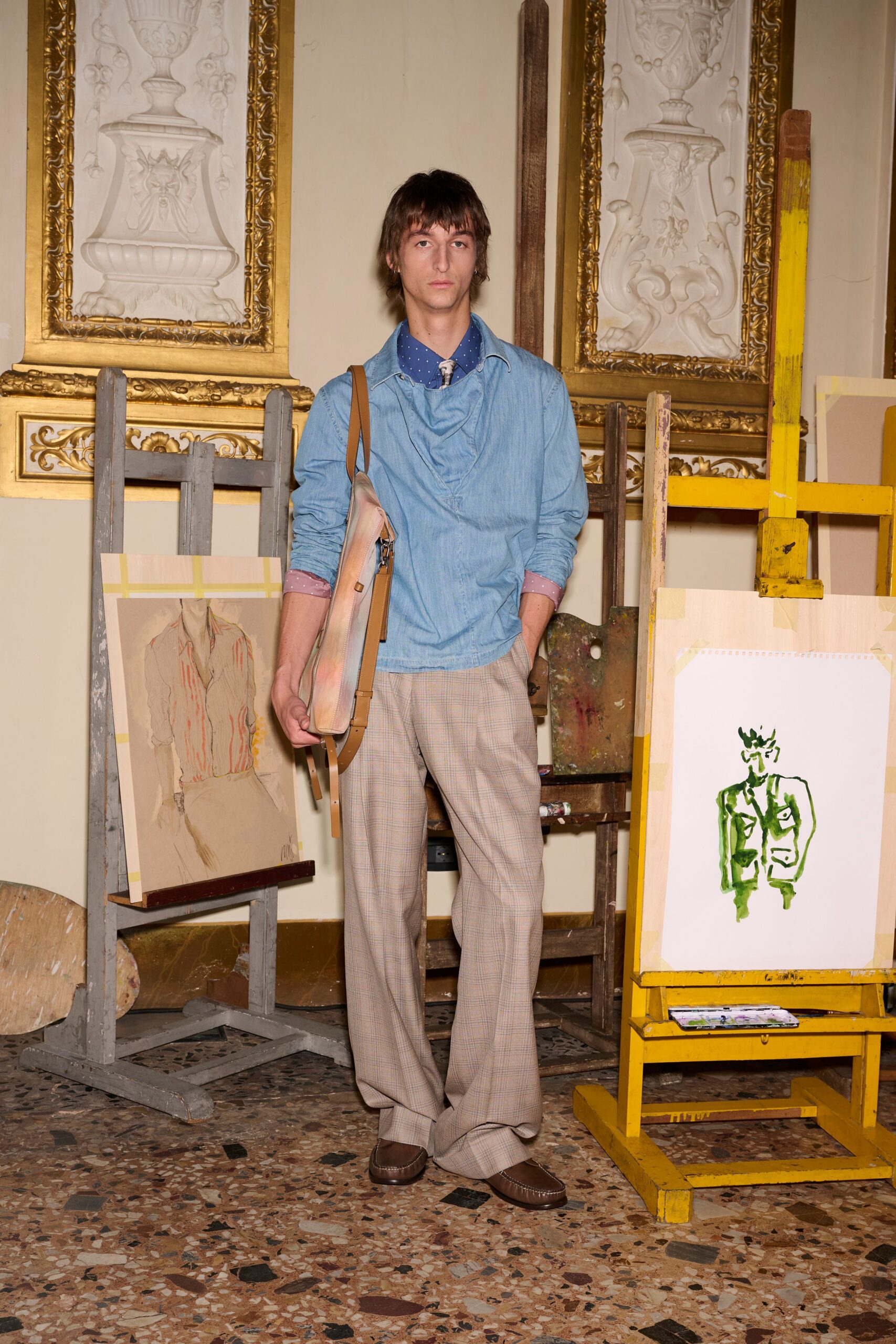 blue relaxed shirt with beige tailored pants