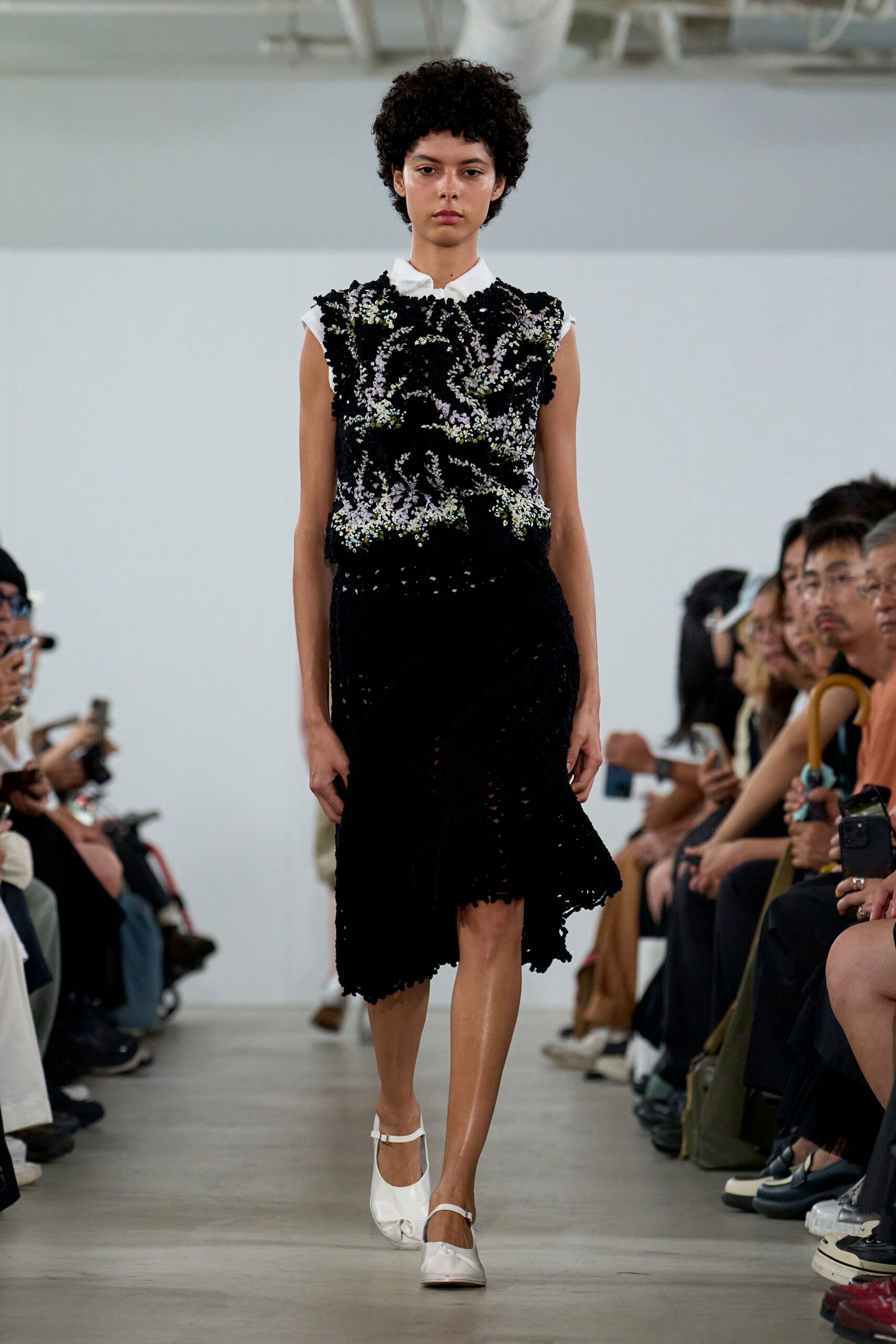 black embroidered top and skirt