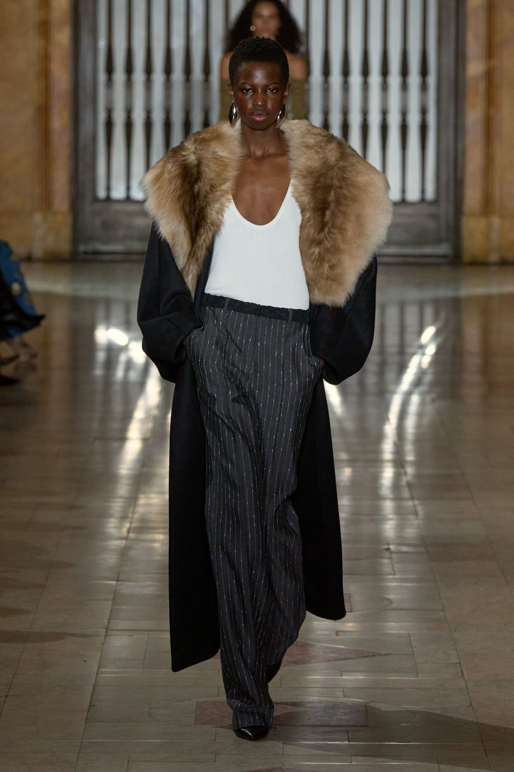 black coat white top striped pants
