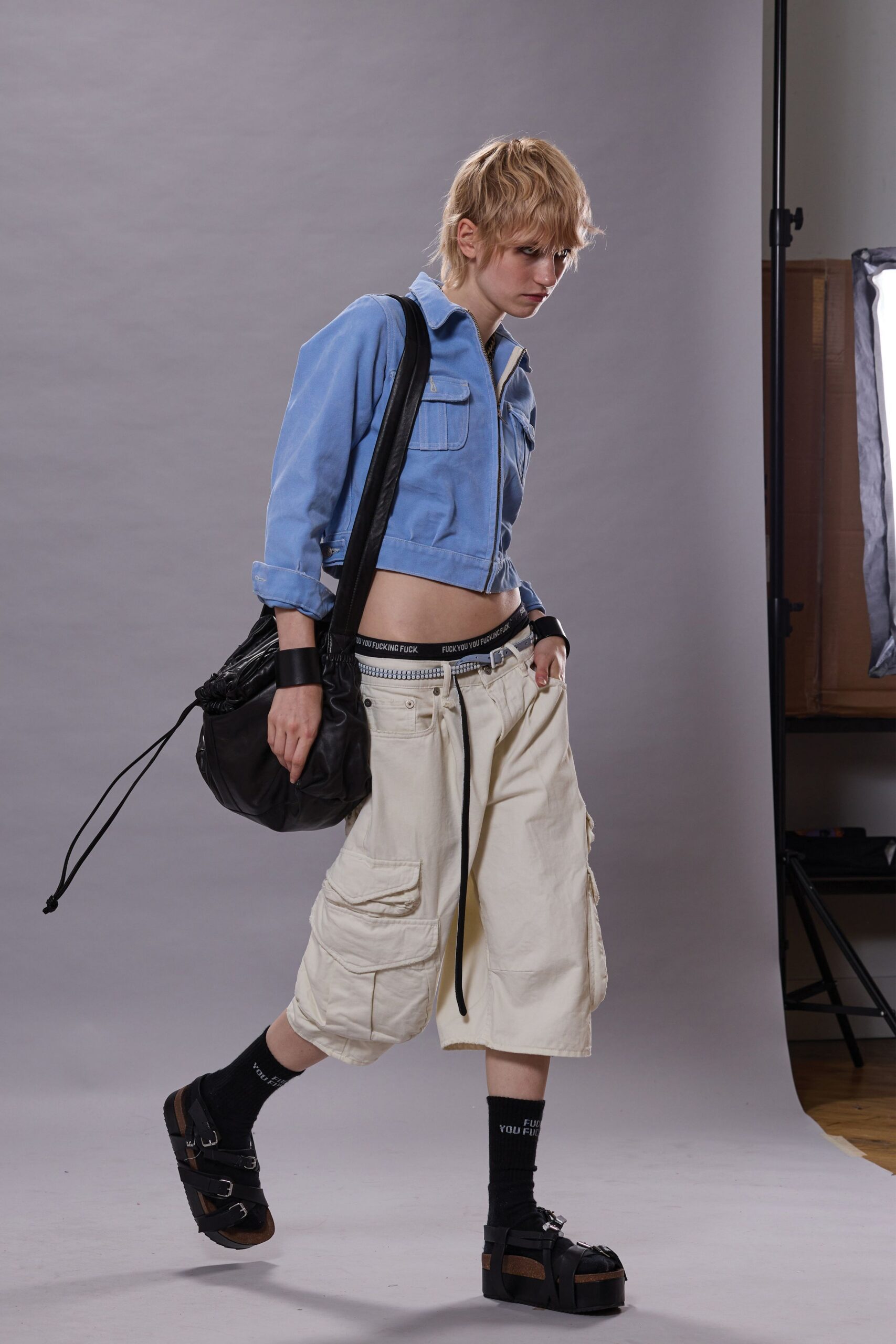 blue cotton fitted jacket with cargo pants