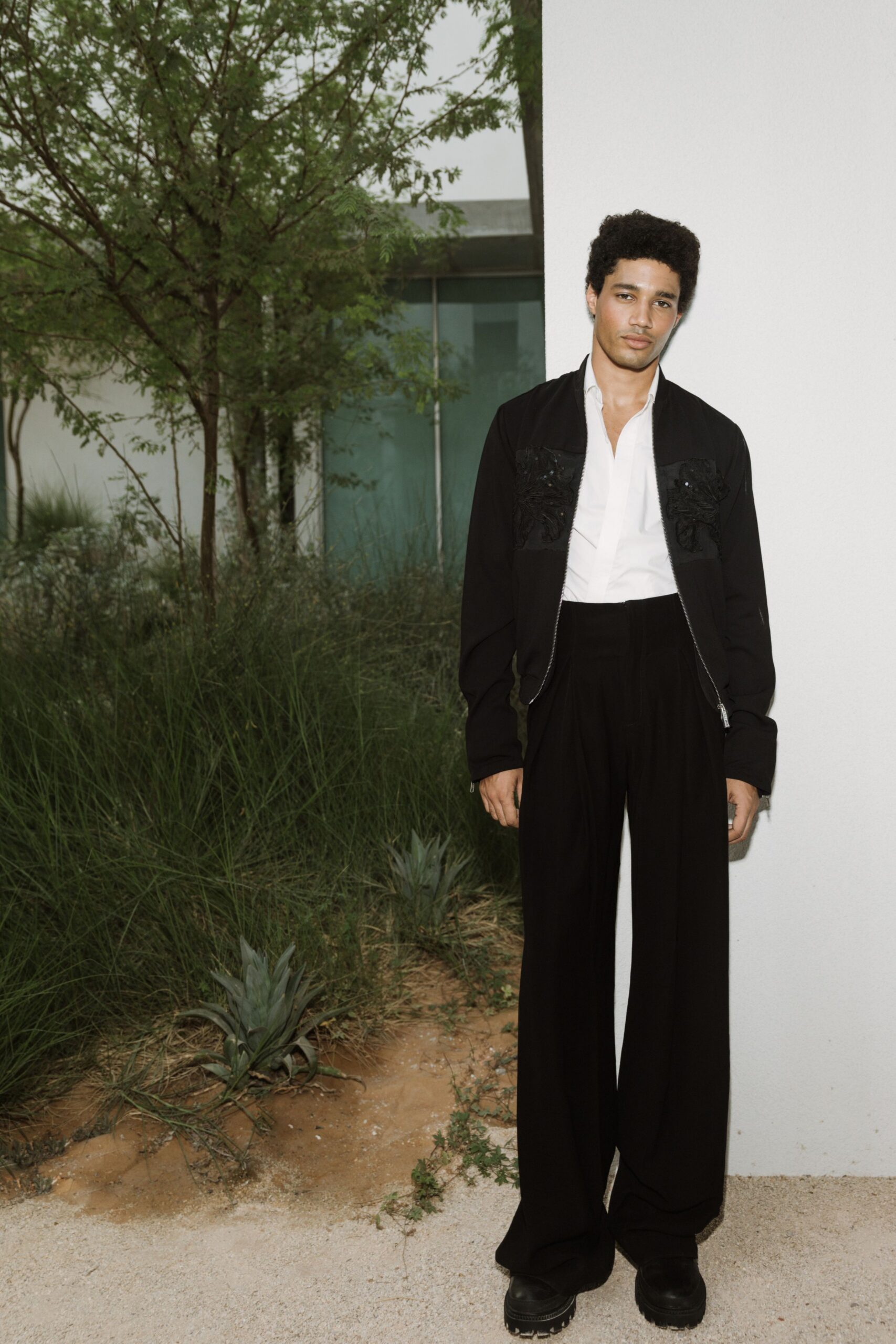 black jacket white shirt tailored pants
