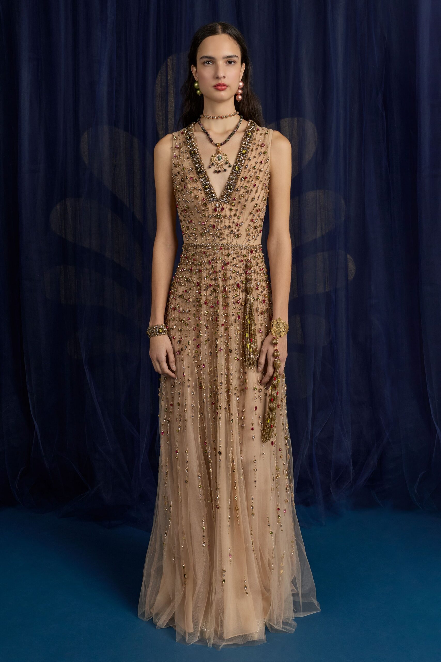 beige embroidered sleeveless gown
