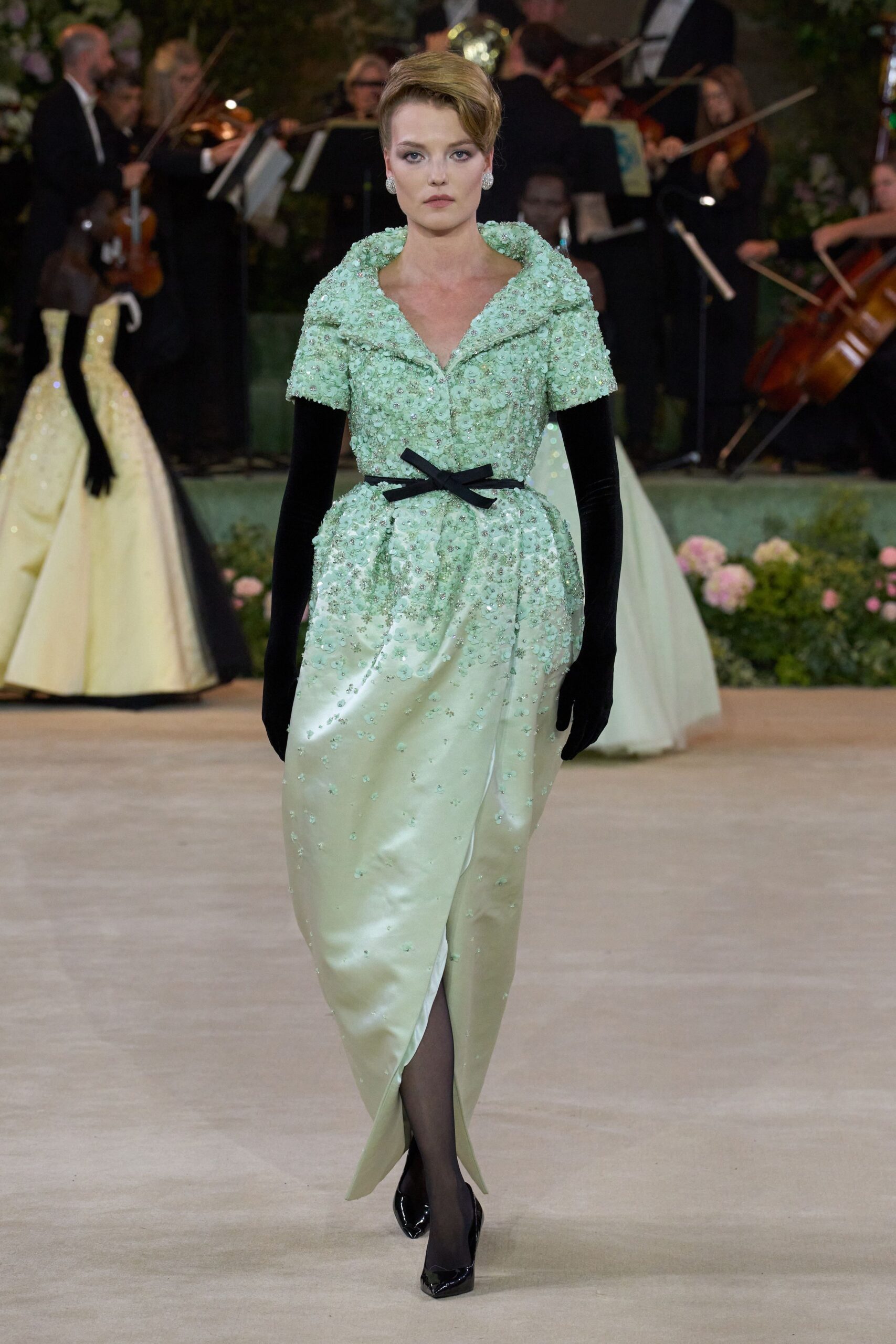 green silk long-sleeve v-neck fitted embellished tiered gown