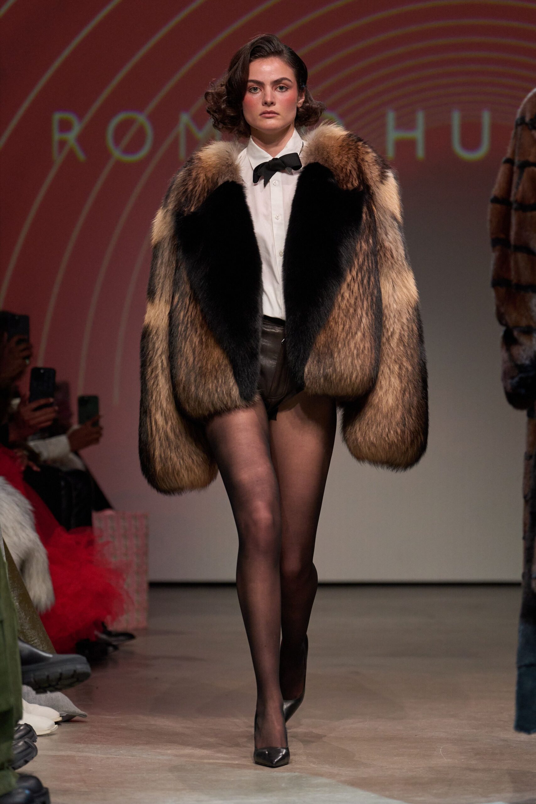 fur coat with leather shorts