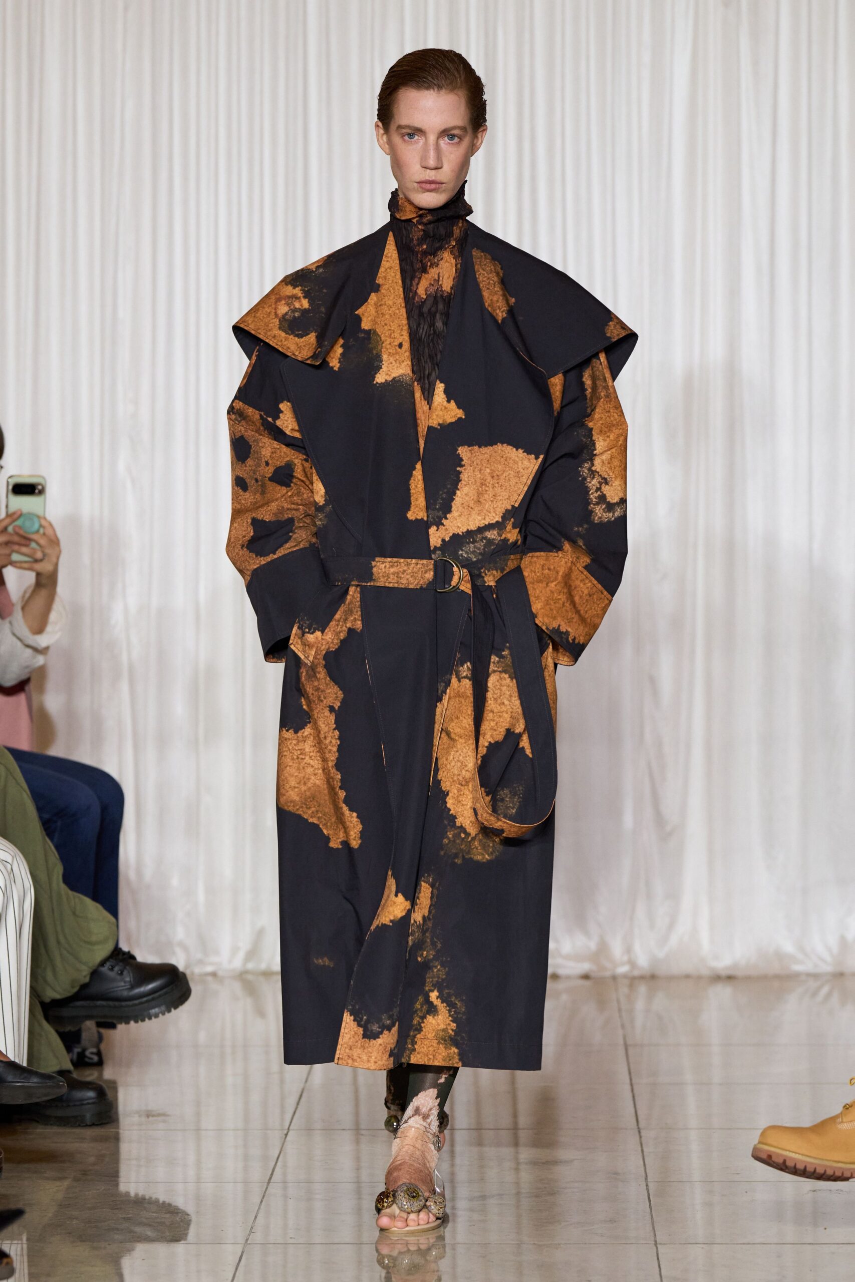 black and orange printed coat