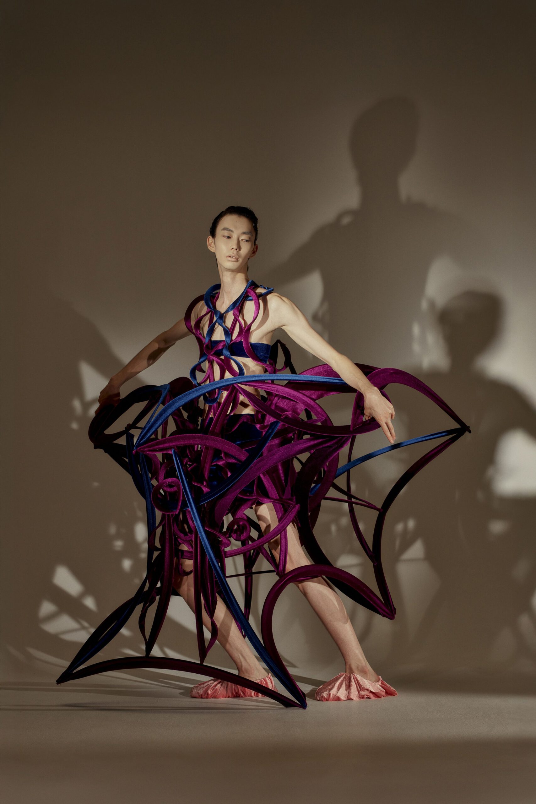 asymmetric layered purple dress with pink shoes