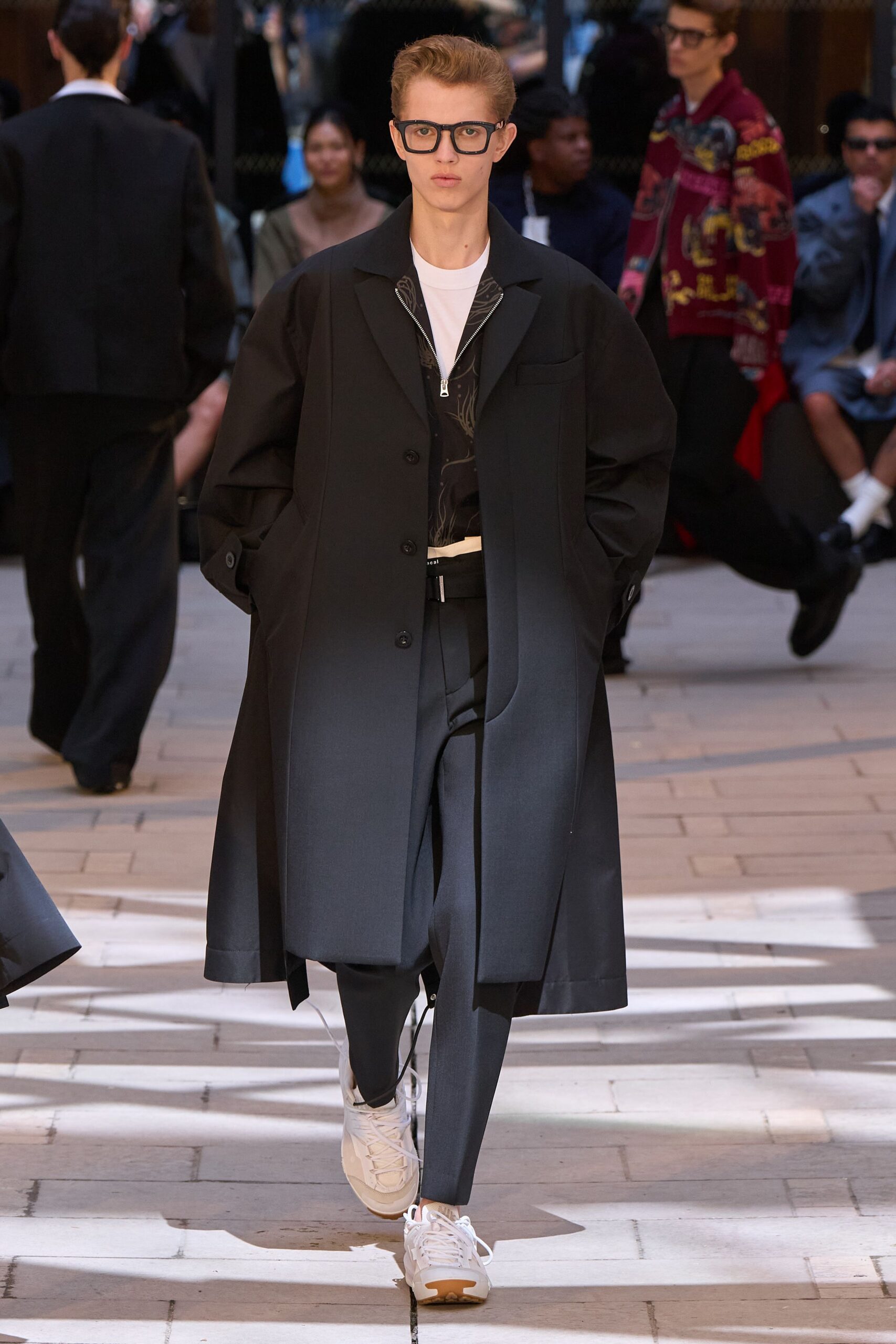 black coat white shirt black pants white shoes
