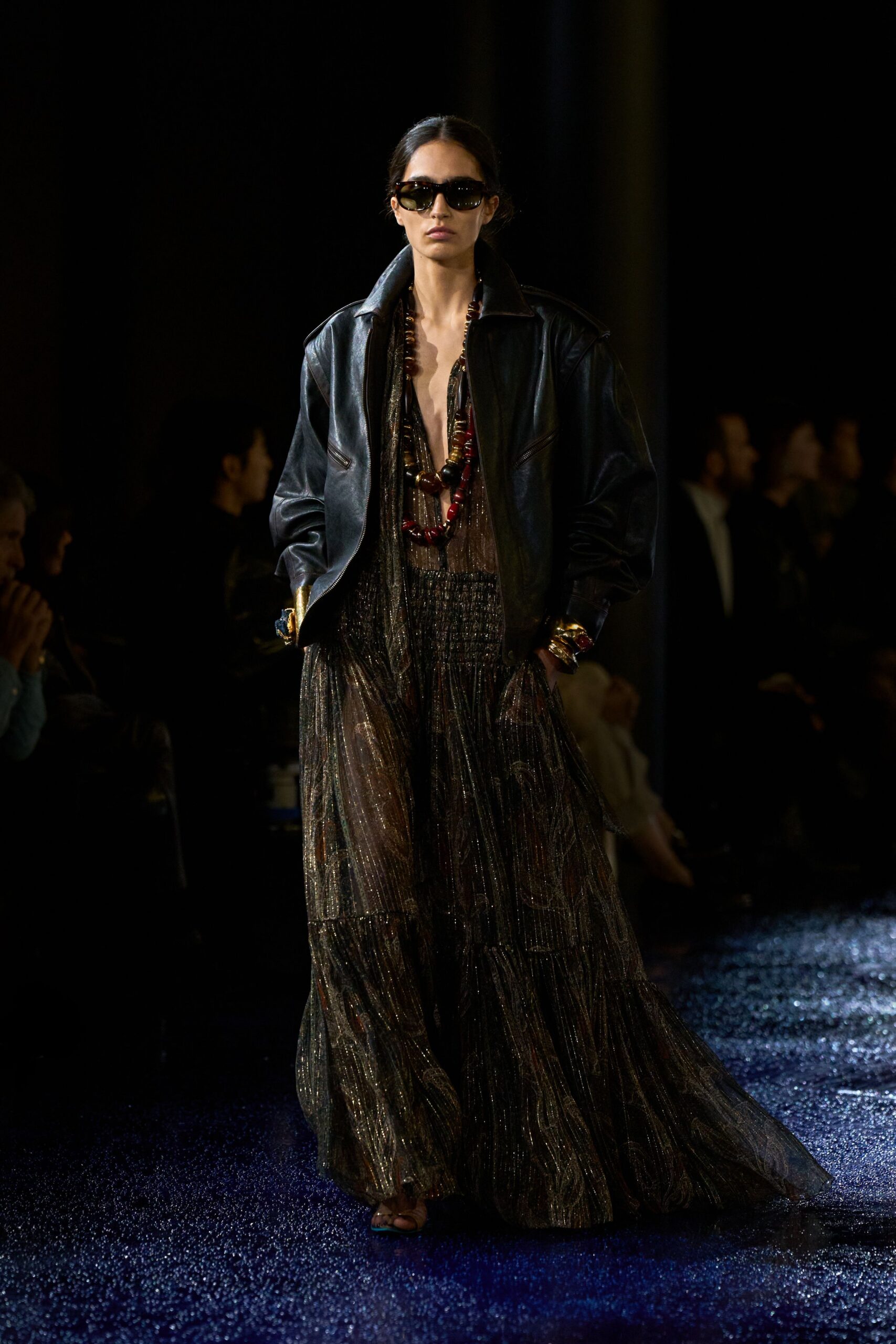 black multi-tiered maxi dress with oversized leather jacket