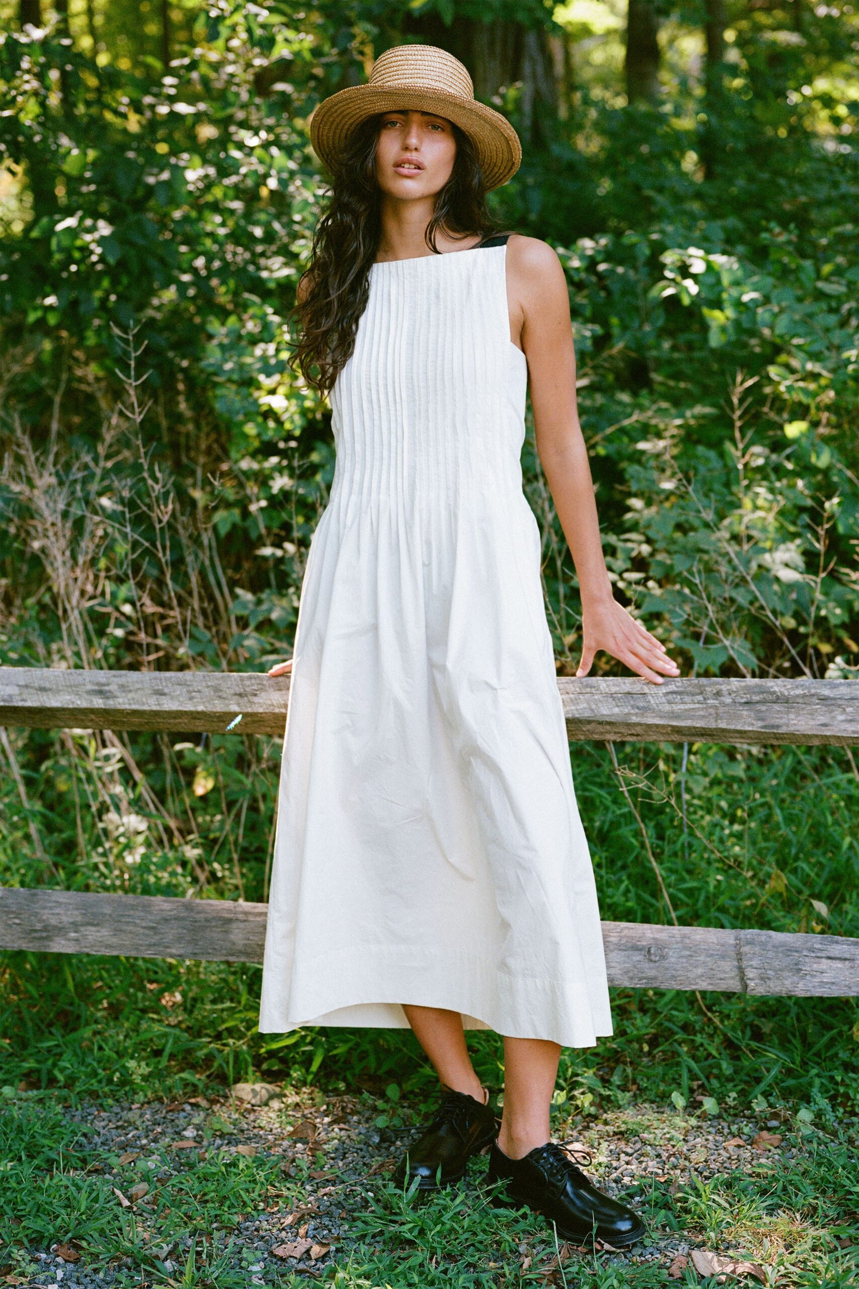 white cotton sleeveless high-neck fitted pleated tiered dress