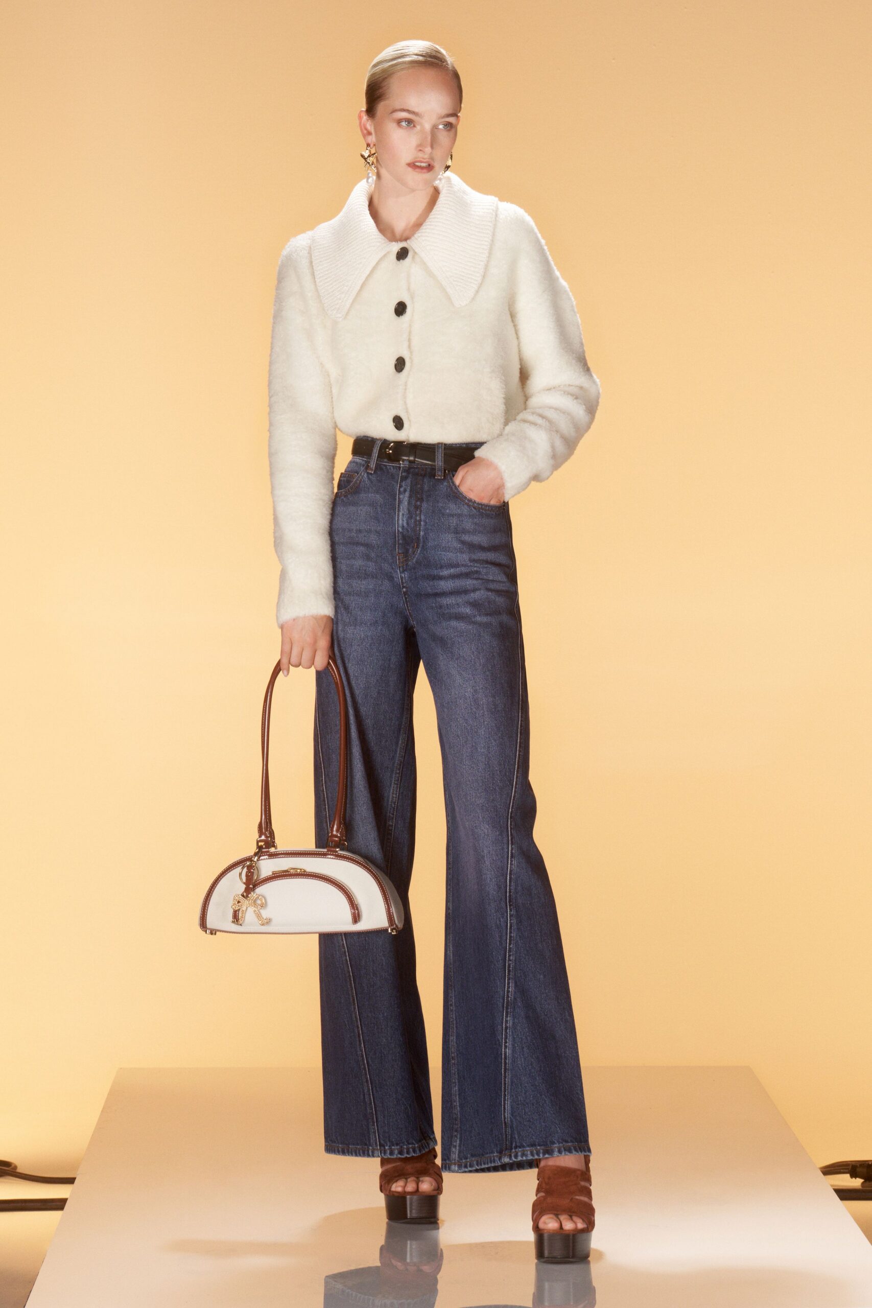 white wool jacket with flared jeans