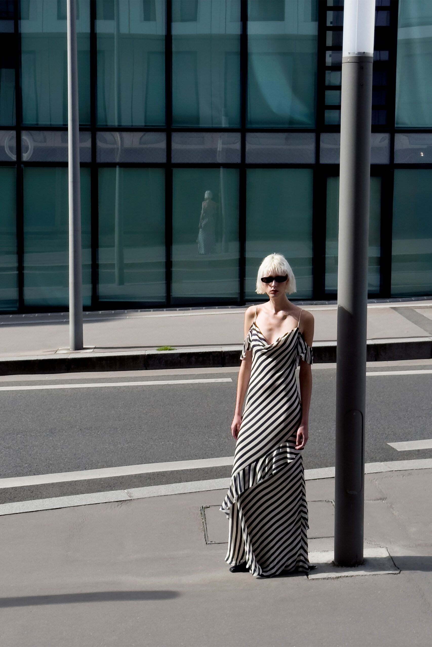 striped black and white gown with sunglasses