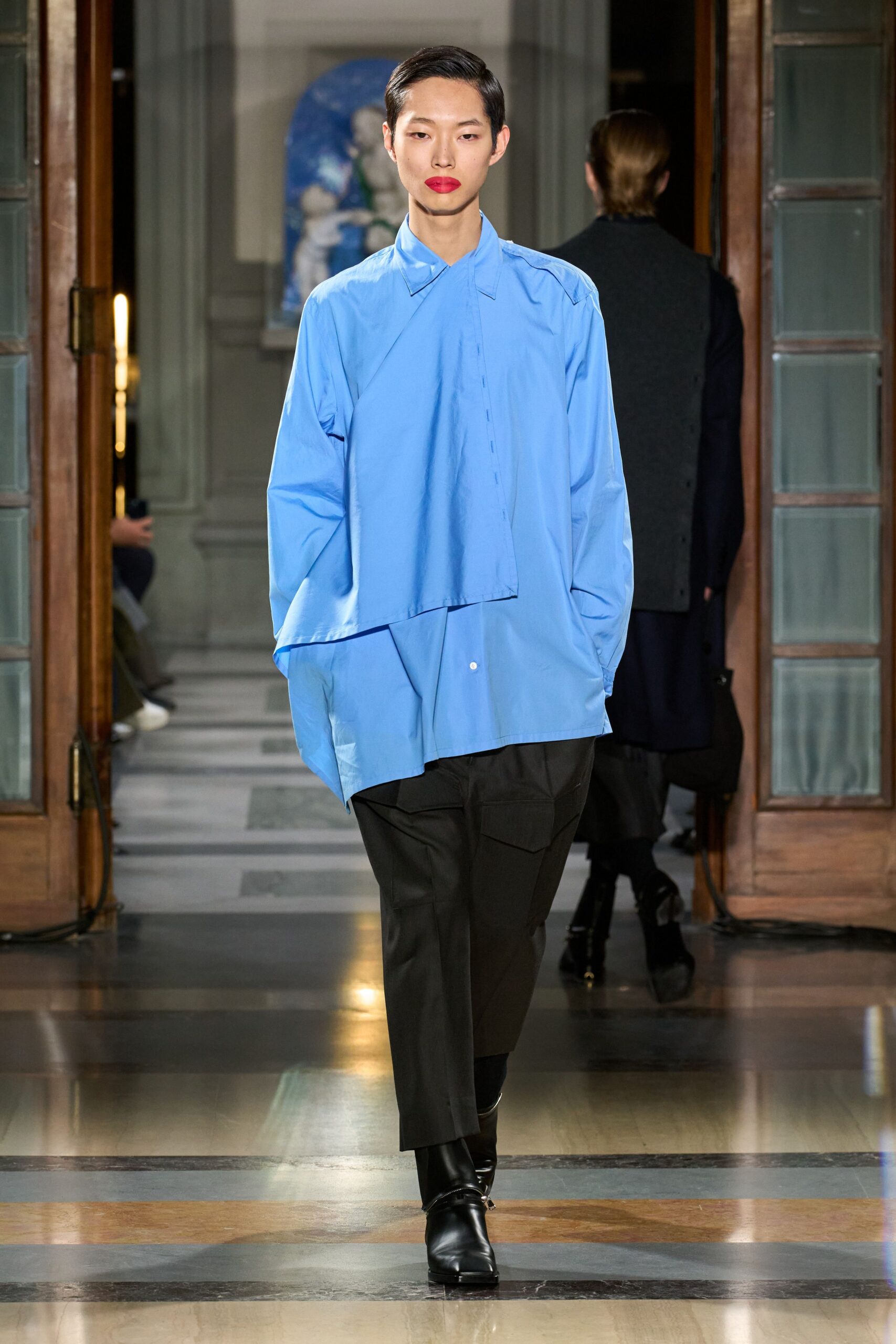 blue relaxed shirt with black tailored pants