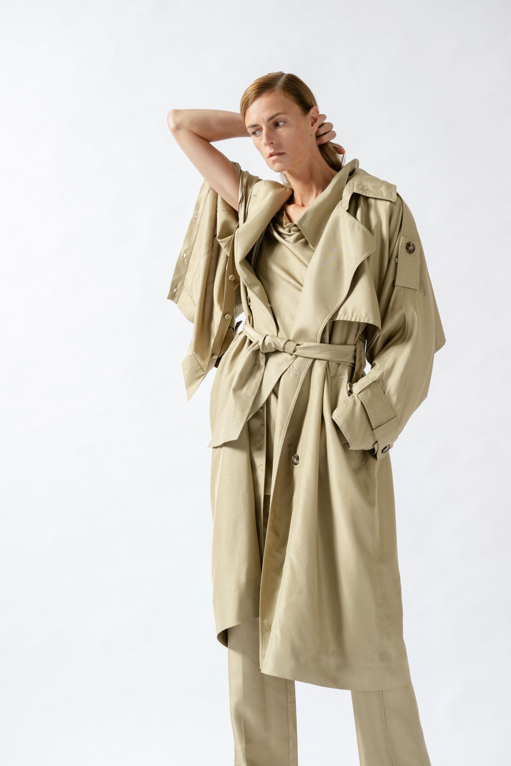 beige trench coat with silk top