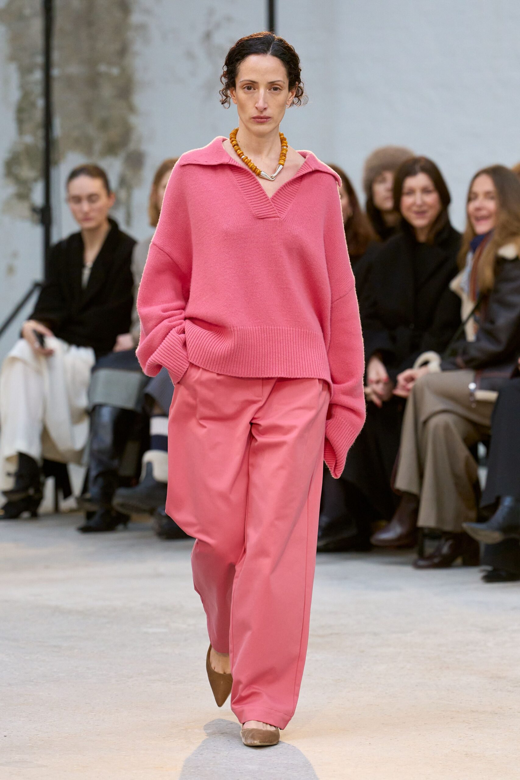 pink oversized sweater and relaxed pants