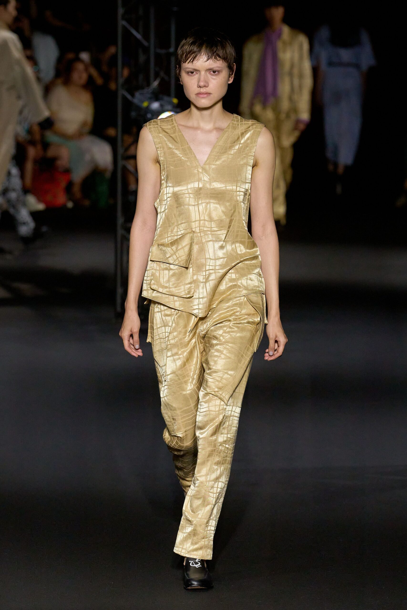 gold silk sleeveless v-neck fitted pleated shiny jumpsuit