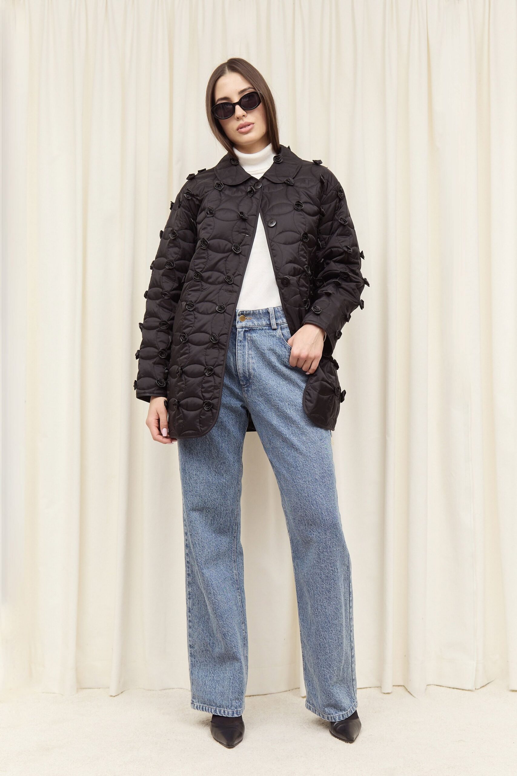 black padded jacket with jeans