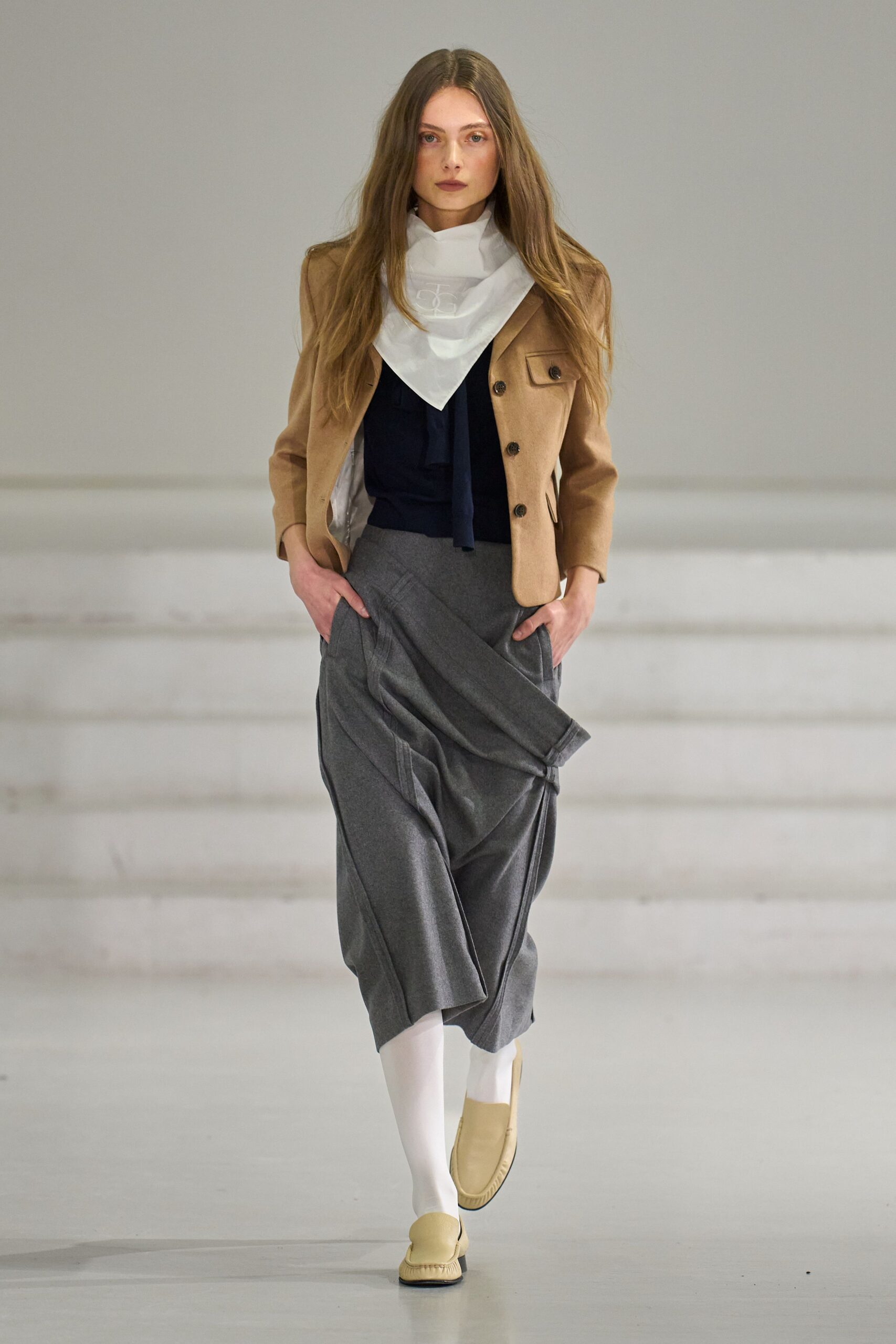 beige blazer with gray skirt